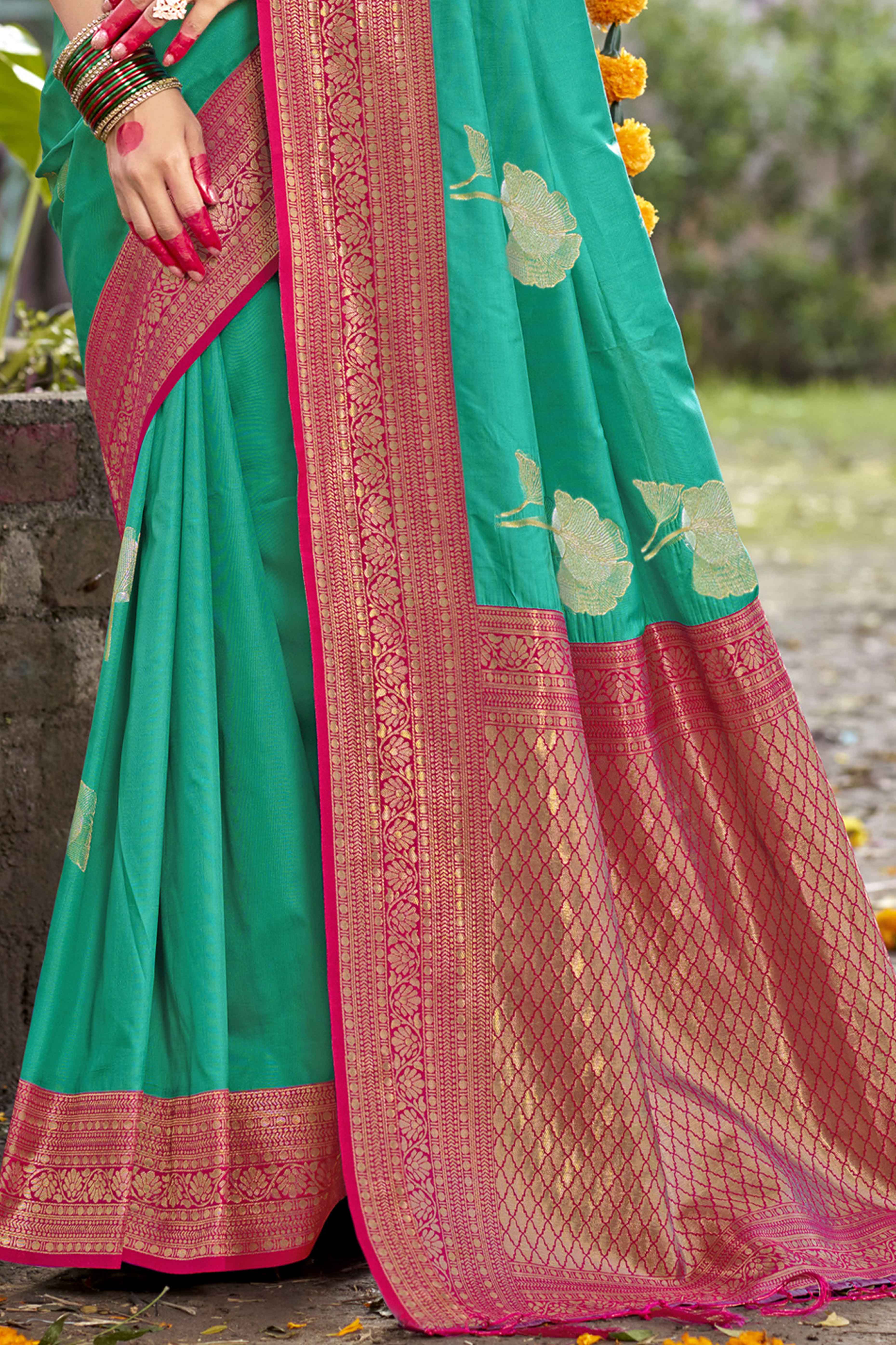 Rama Green Floral Woven Banarasi Silk Saree With Tassels