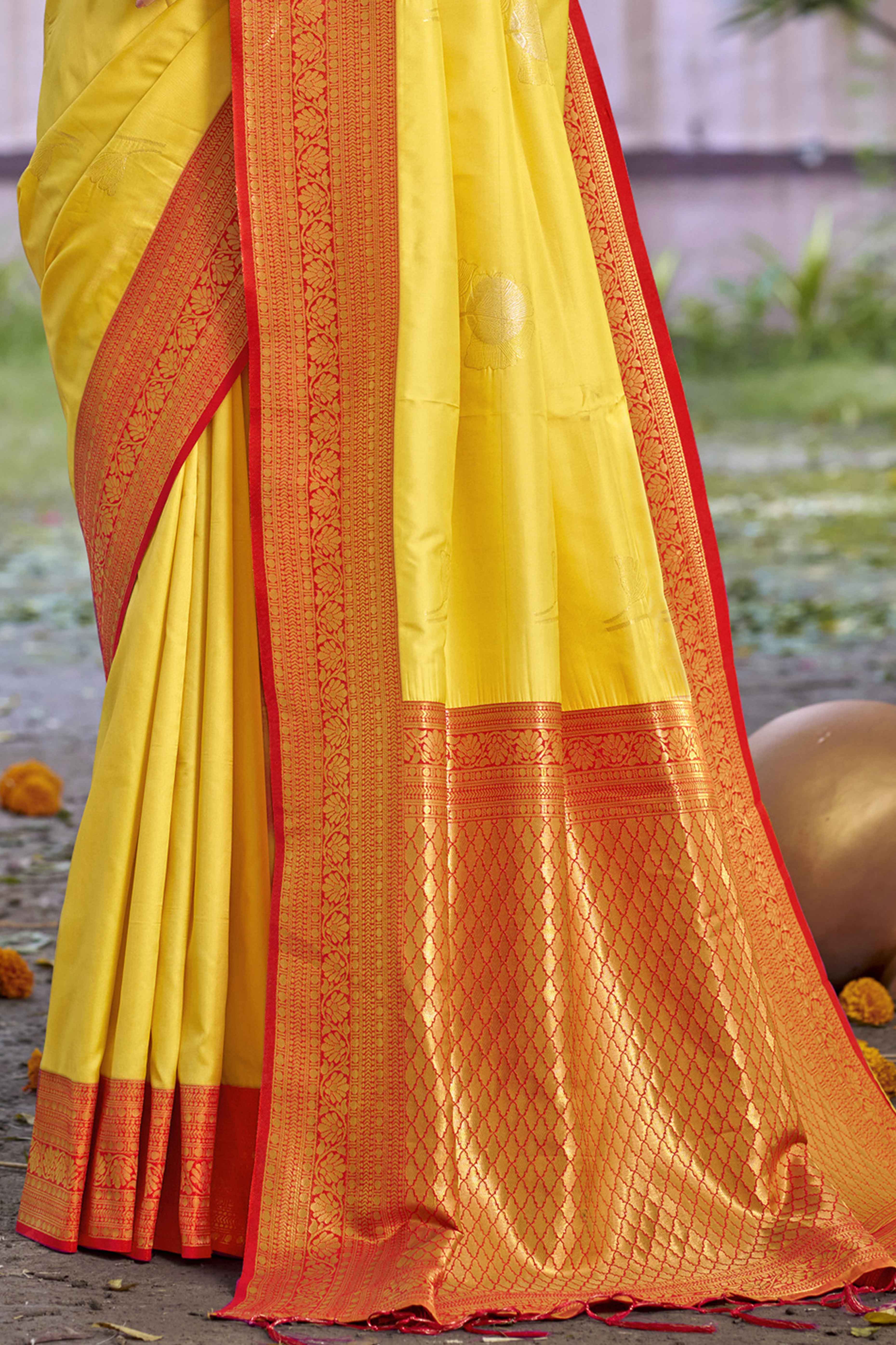 Yellow Floral Woven Banarasi Silk Saree With Tassels