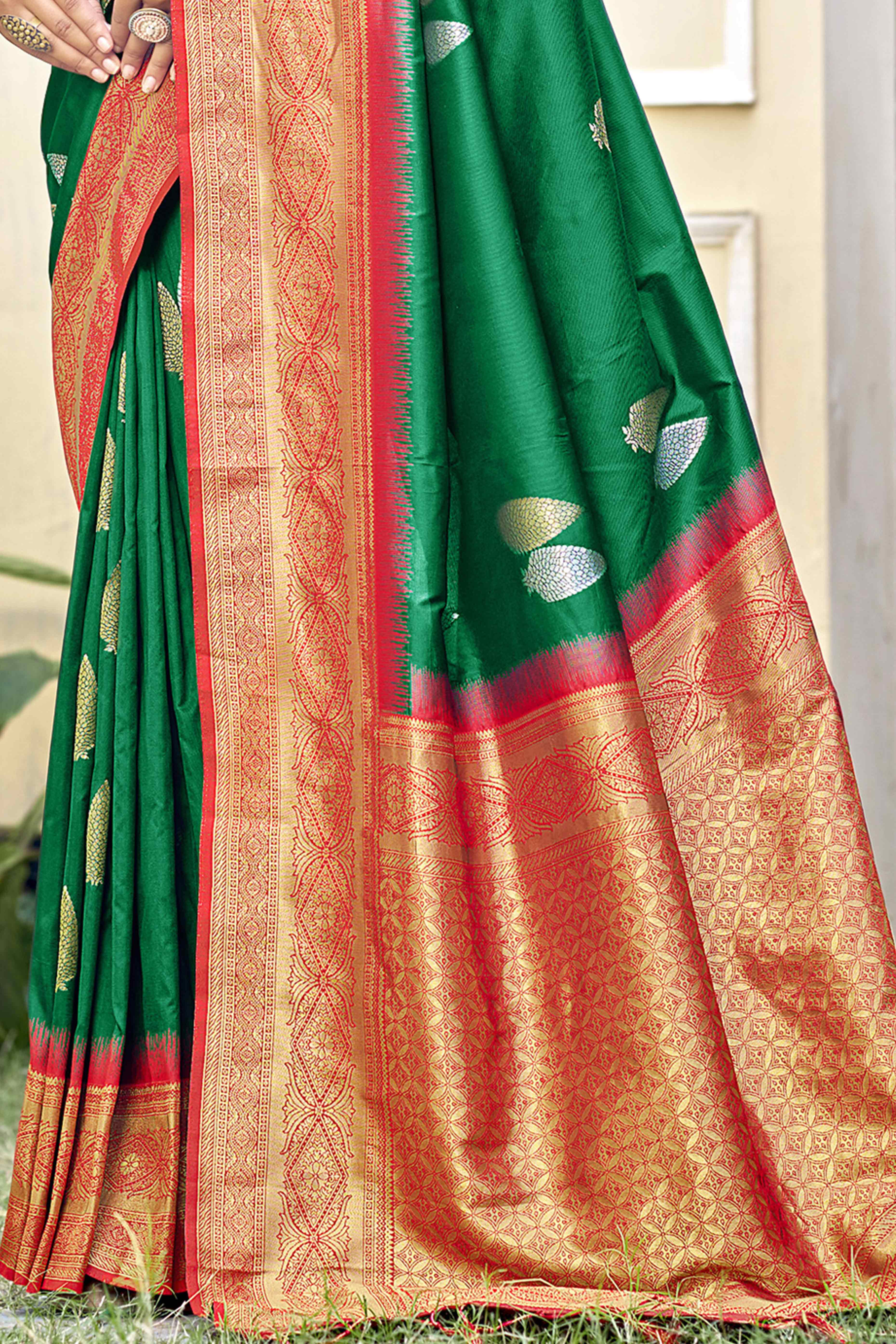 Green Woven Banarasi Silk Saree With Tassels