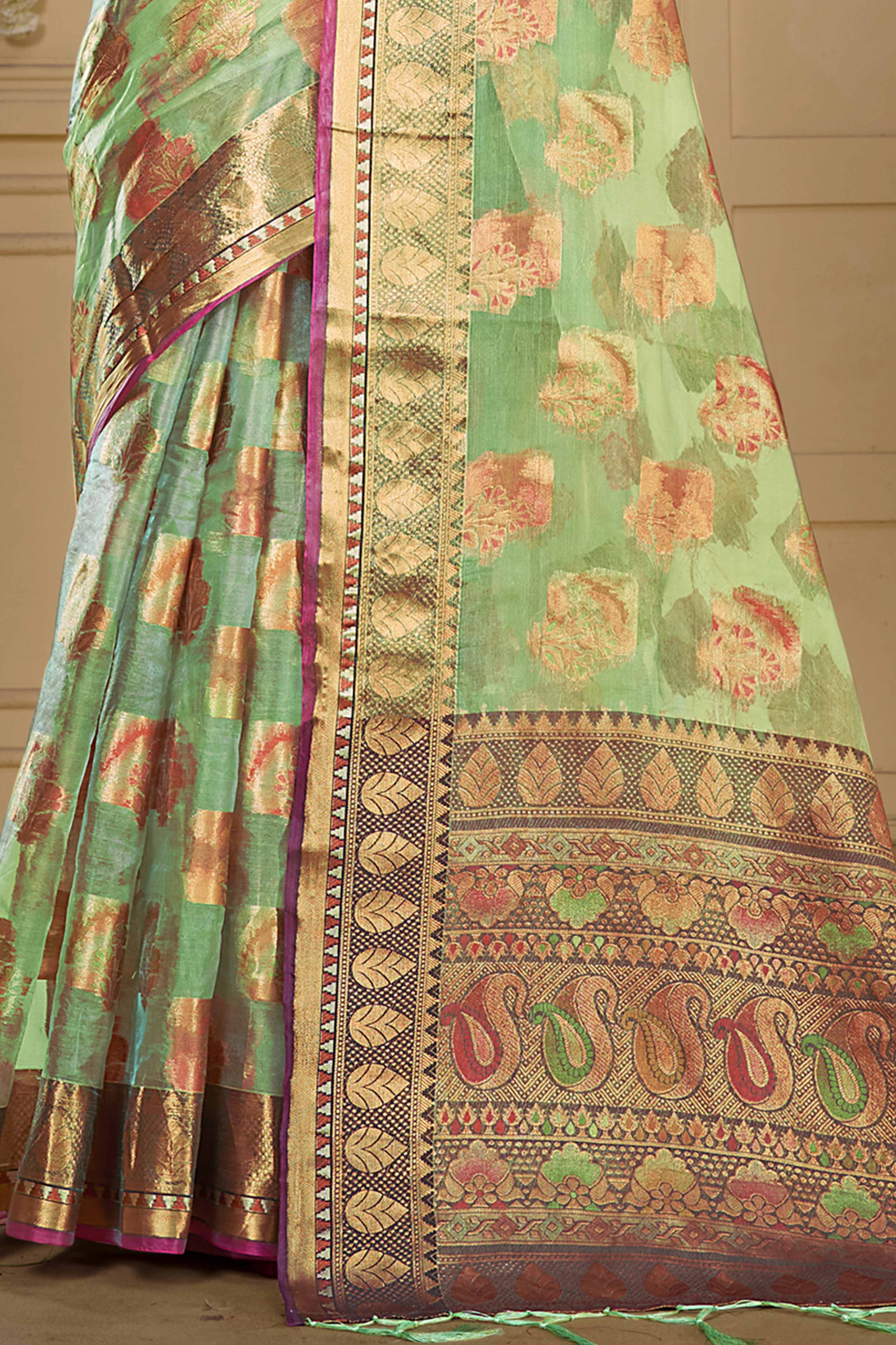 Pista Green Floral Woven Organza Saree With Tassels