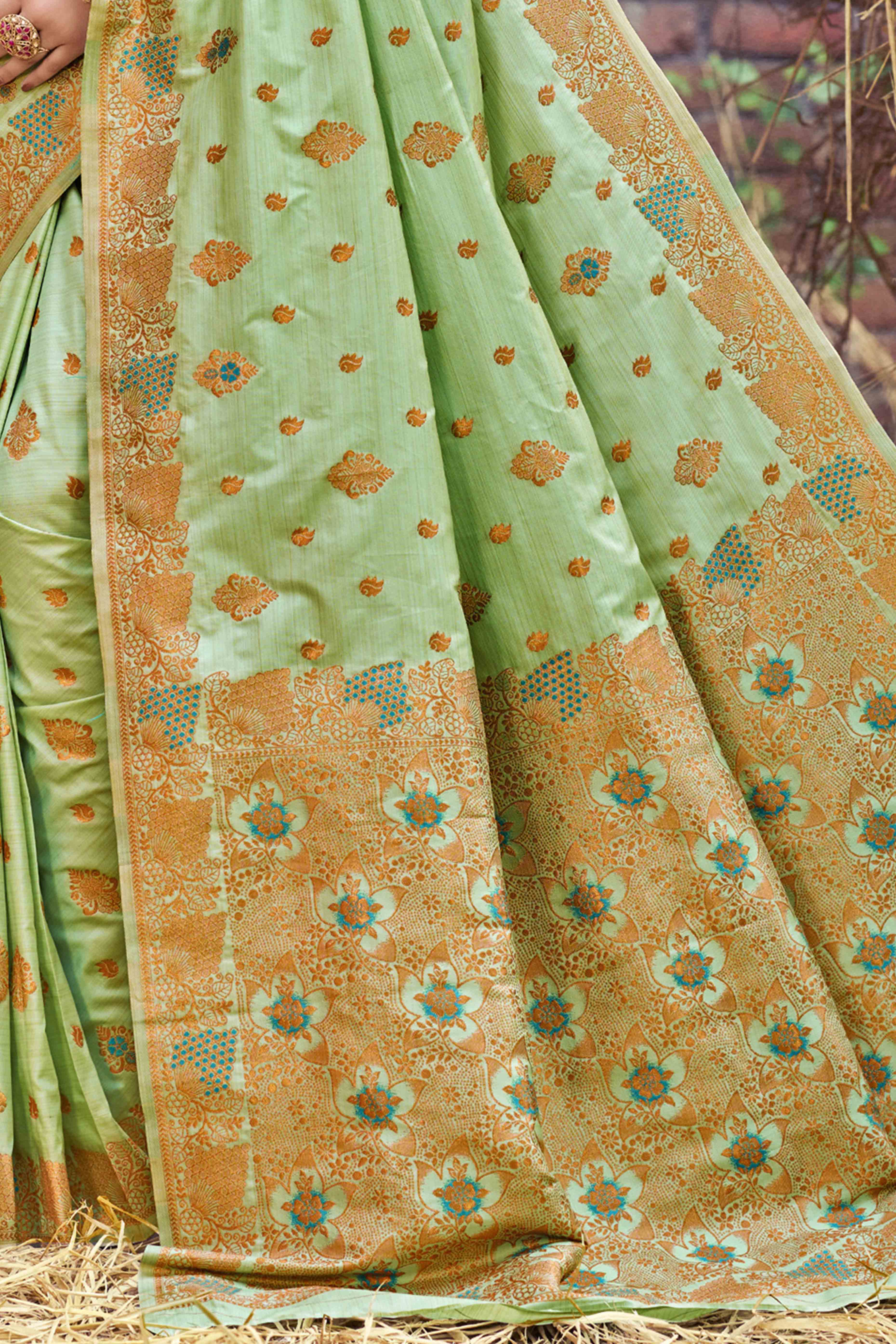 Green Banarasi Silk Saree Adorned With Woven Zari Floral Motifs