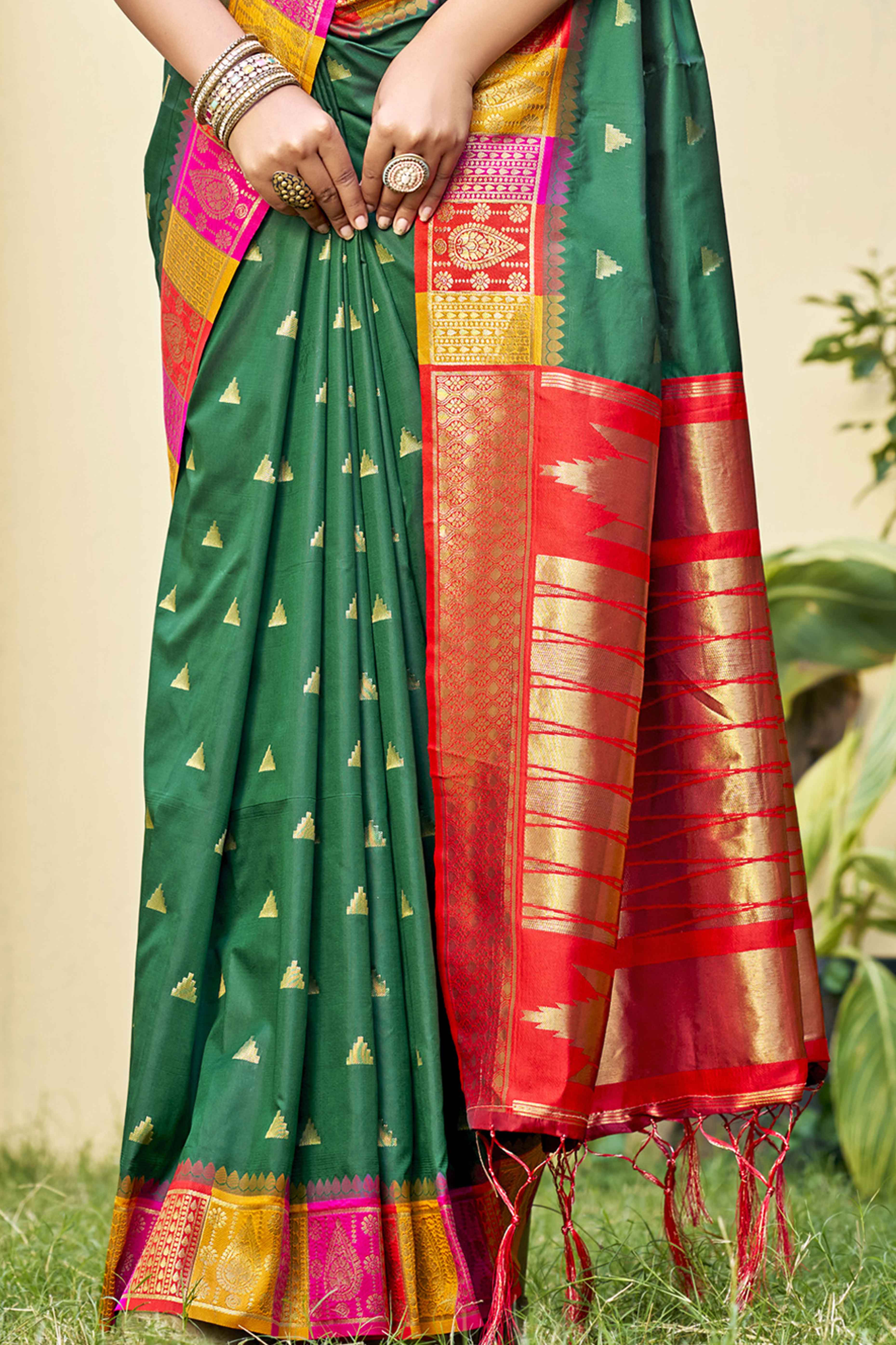 Green Woven Banarasi Silk Saree With Tassels