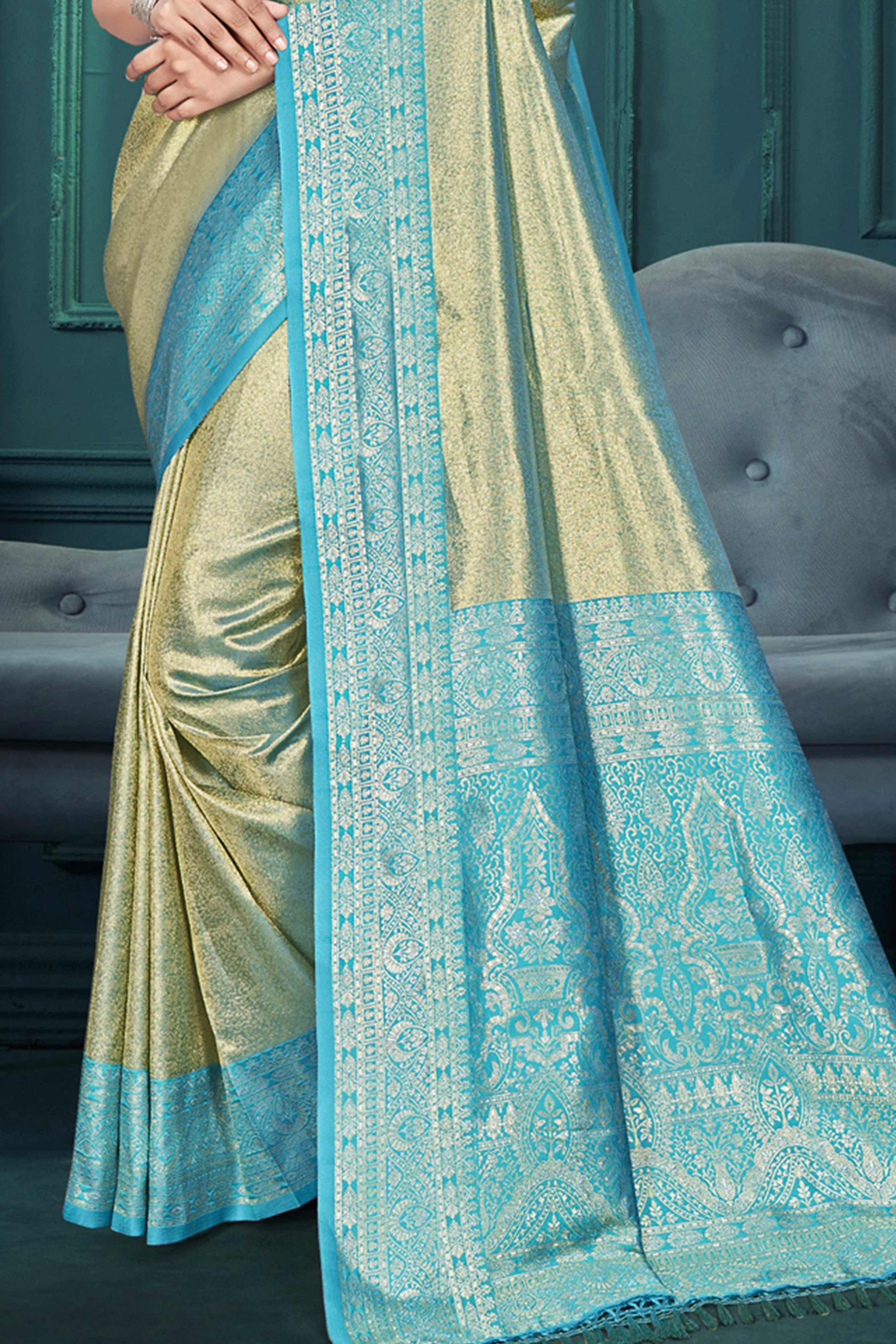 Exclusive Sage Green Floral Motif Woven Kanjivaram Silk Saree With Graceful Tassel Pallu