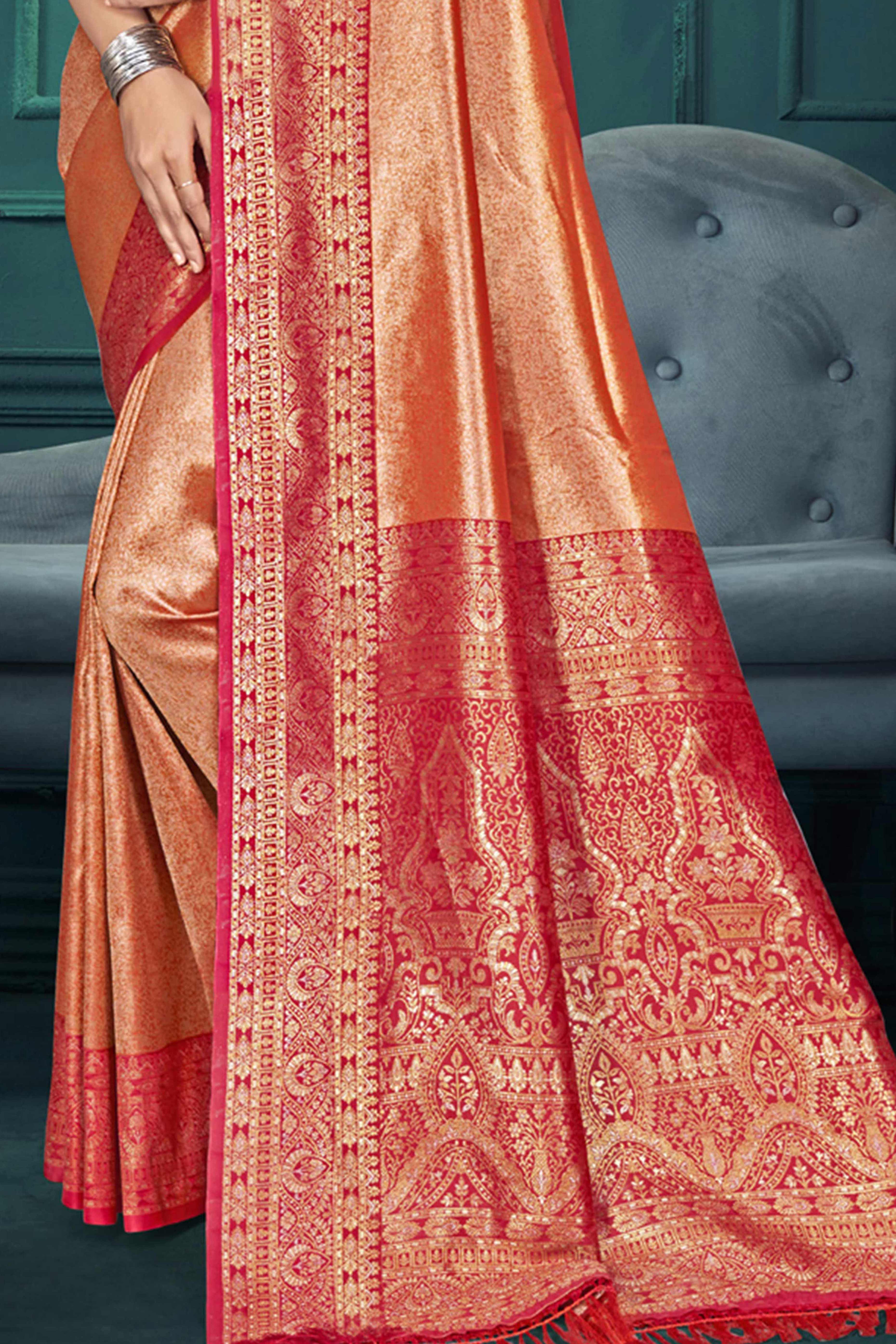 Exclusive Peach Floral Motif Woven Kanjivaram Silk Saree With Graceful Tassel Pallu