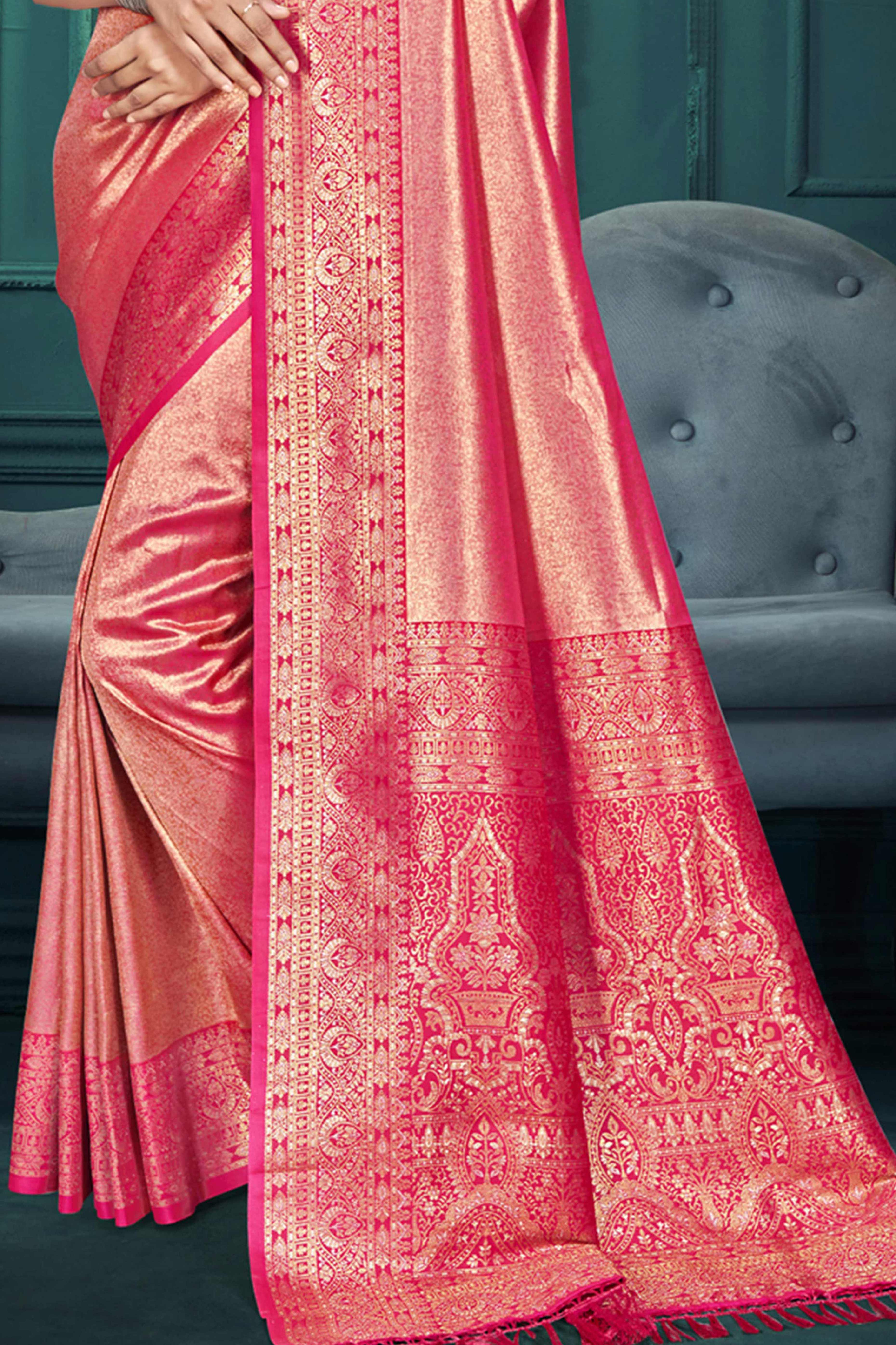 Exclusive Rani Pink Floral Motif Woven Kanjivaram Silk Saree With Graceful Tassel Pallu