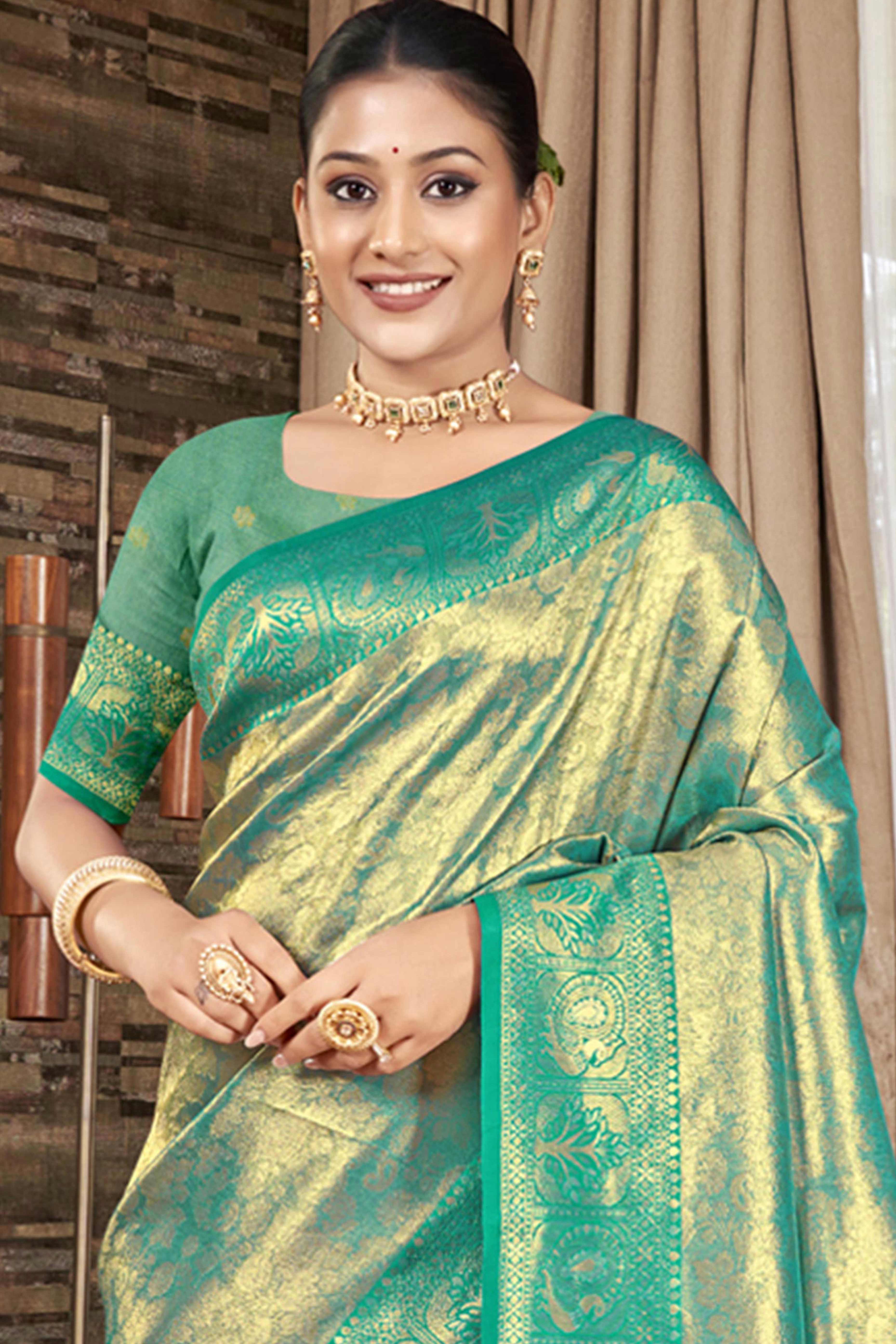 Premium Rama Green Floral and Peacock Motif Woven Kanjivaram Silk Saree With Tassel Pallu