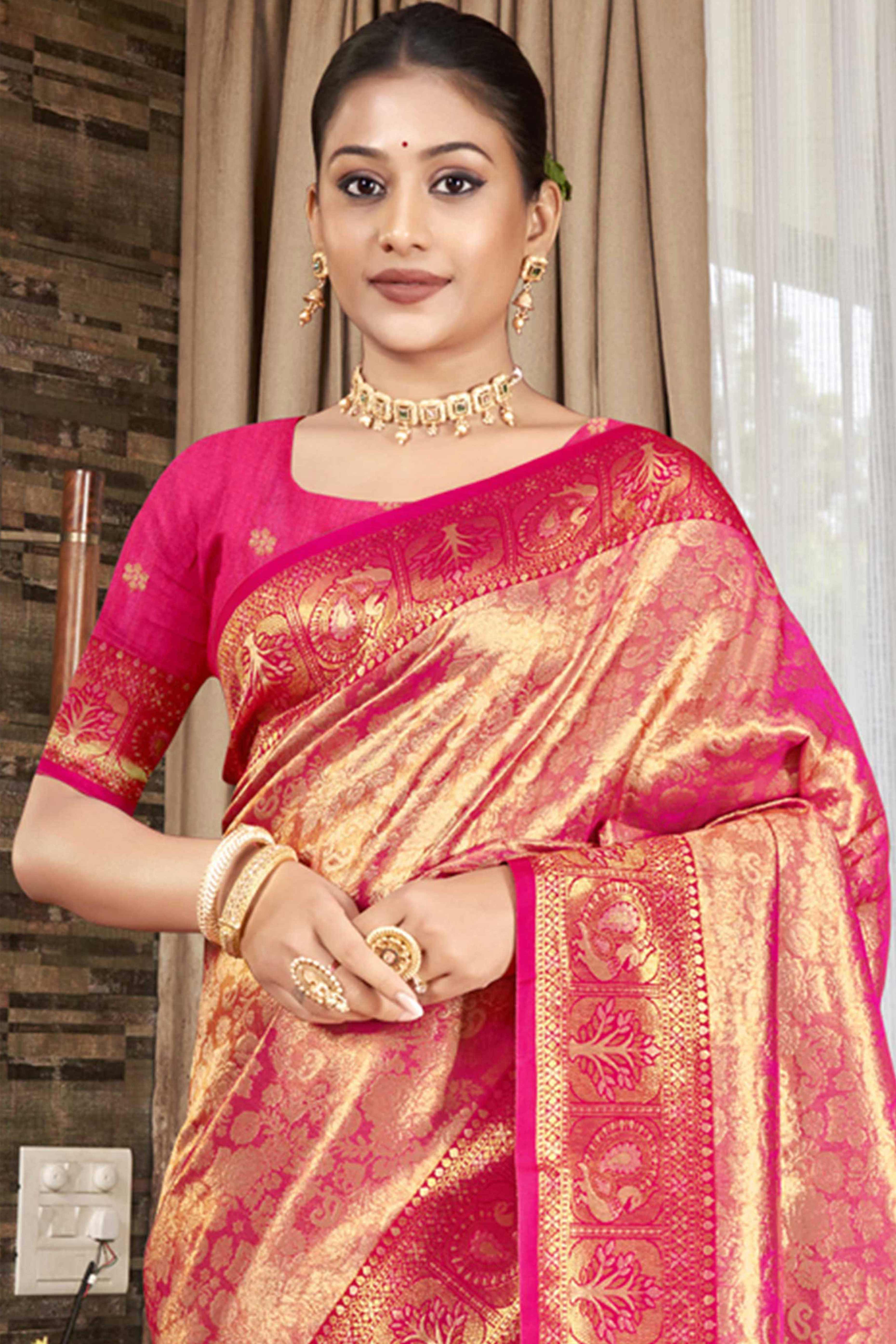 Premium Rani Pink Floral and Peacock Motif Woven Kanjivaram Silk Saree With Tassel Pallu