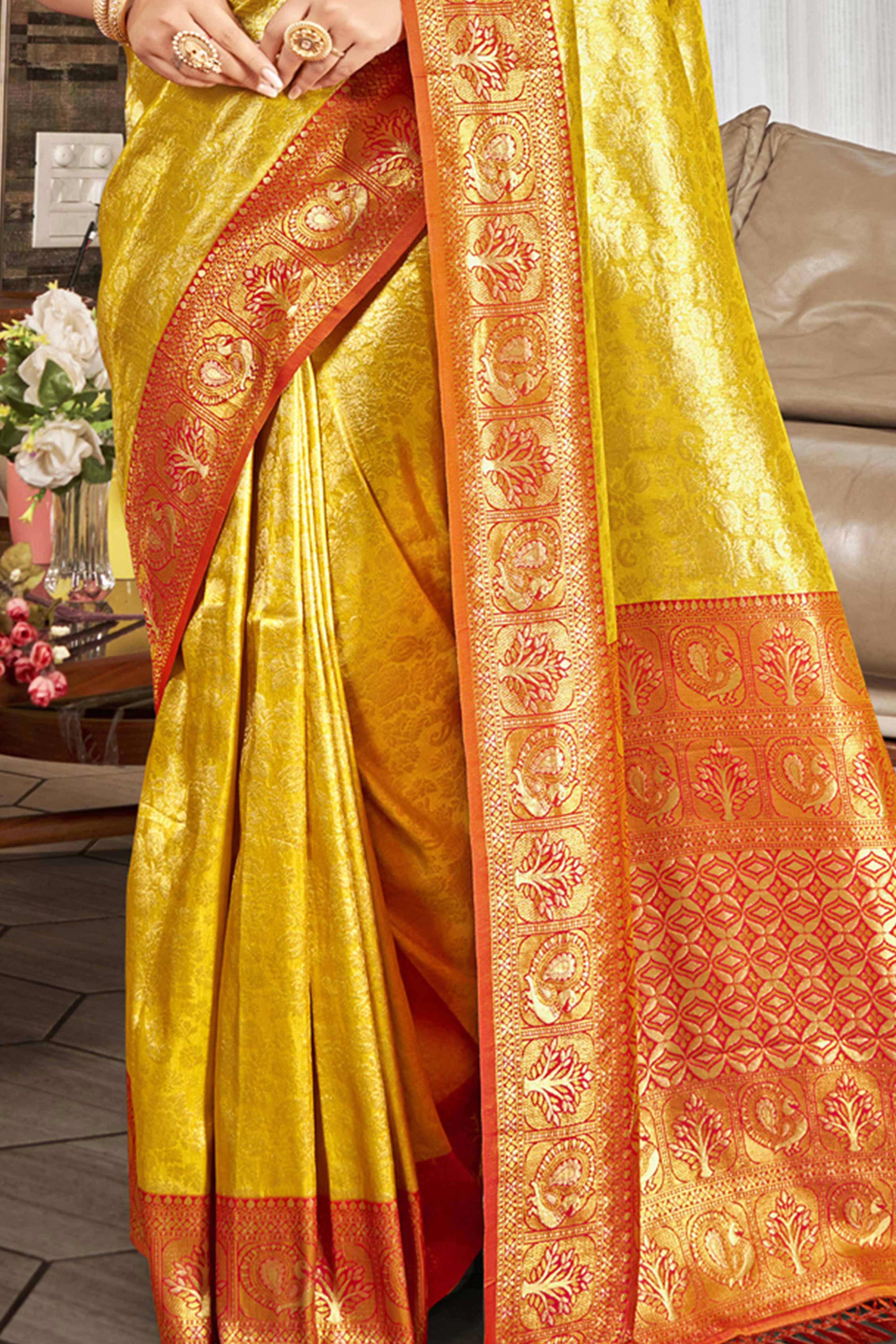 Premium Yellow Floral and Peacock Motif Woven Kanjivaram Silk Saree With Tassel Pallu