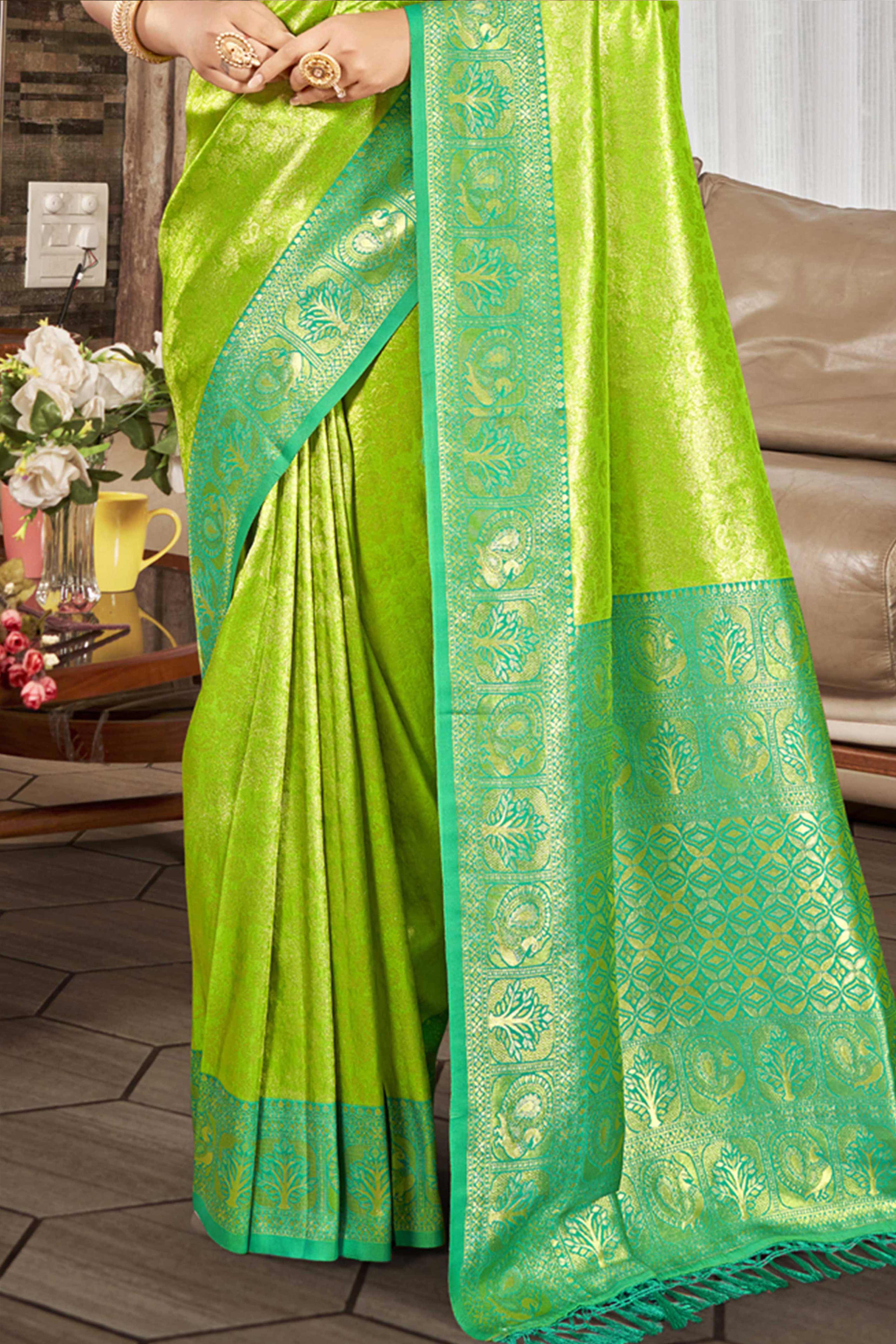 Premium Green Floral and Peacock Motif Woven Kanjivaram Silk Saree With Tassel Pallu