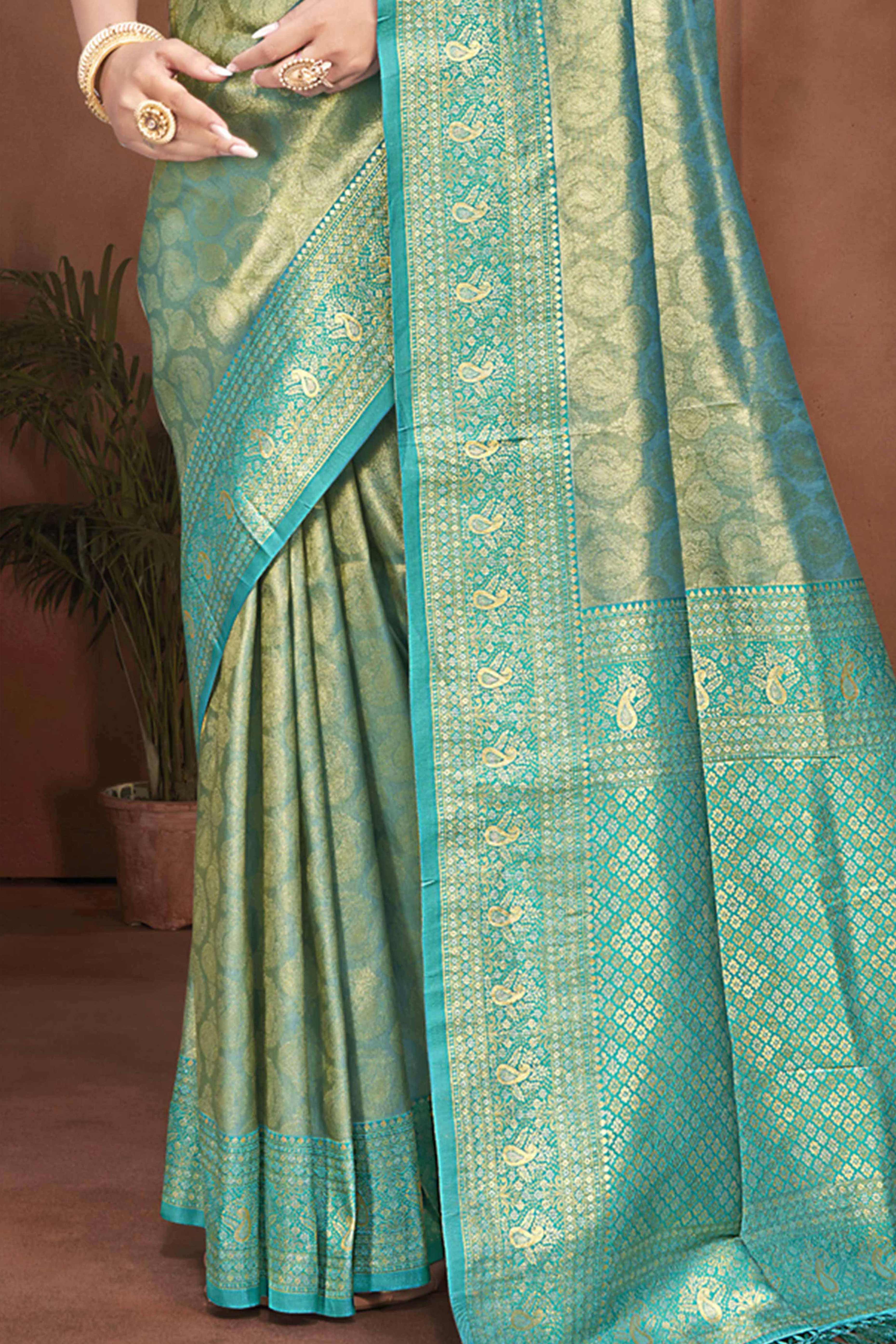 Exclusive Turquoise Paisley & Floral Pattern Weaving Kanjivaram Silk Saree With Tassel Pallu