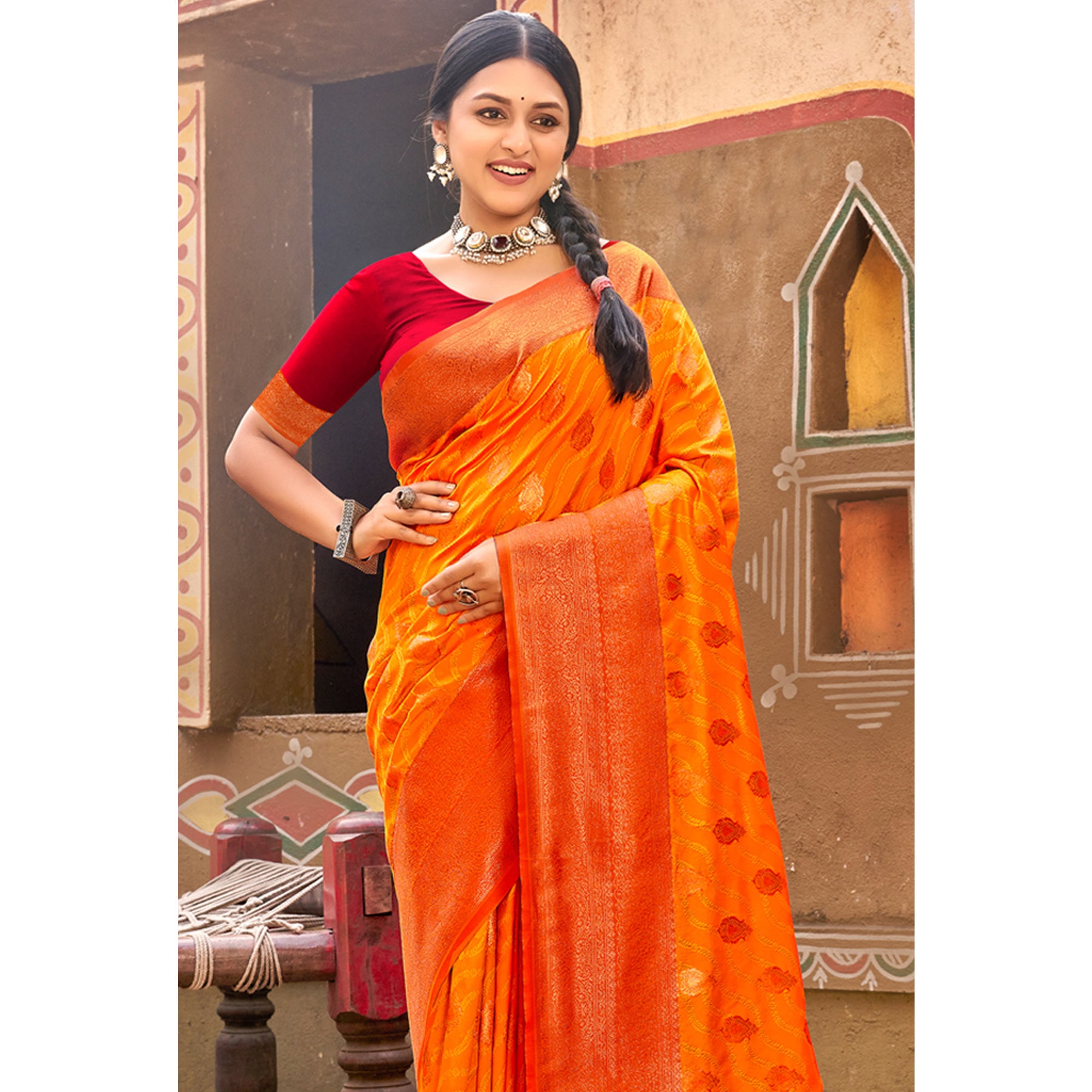 Orange Floral Woven Banarasi Silk Saree With Tassels