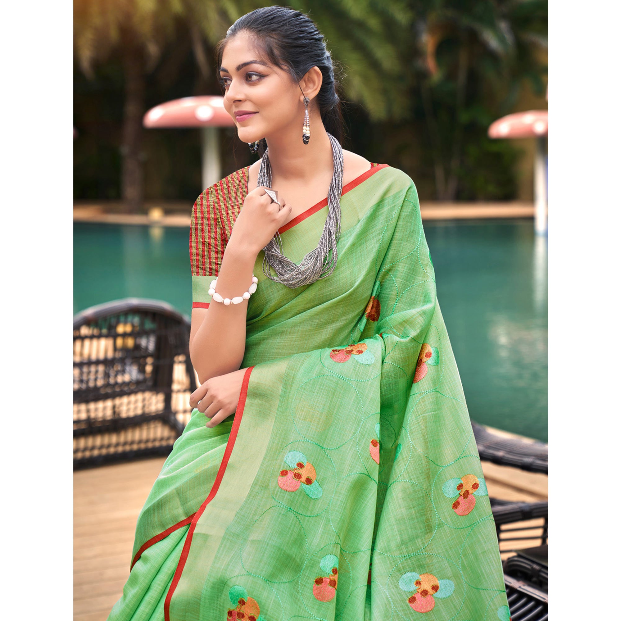 Sea Green Floral Embroidered Linen Saree With Tassels