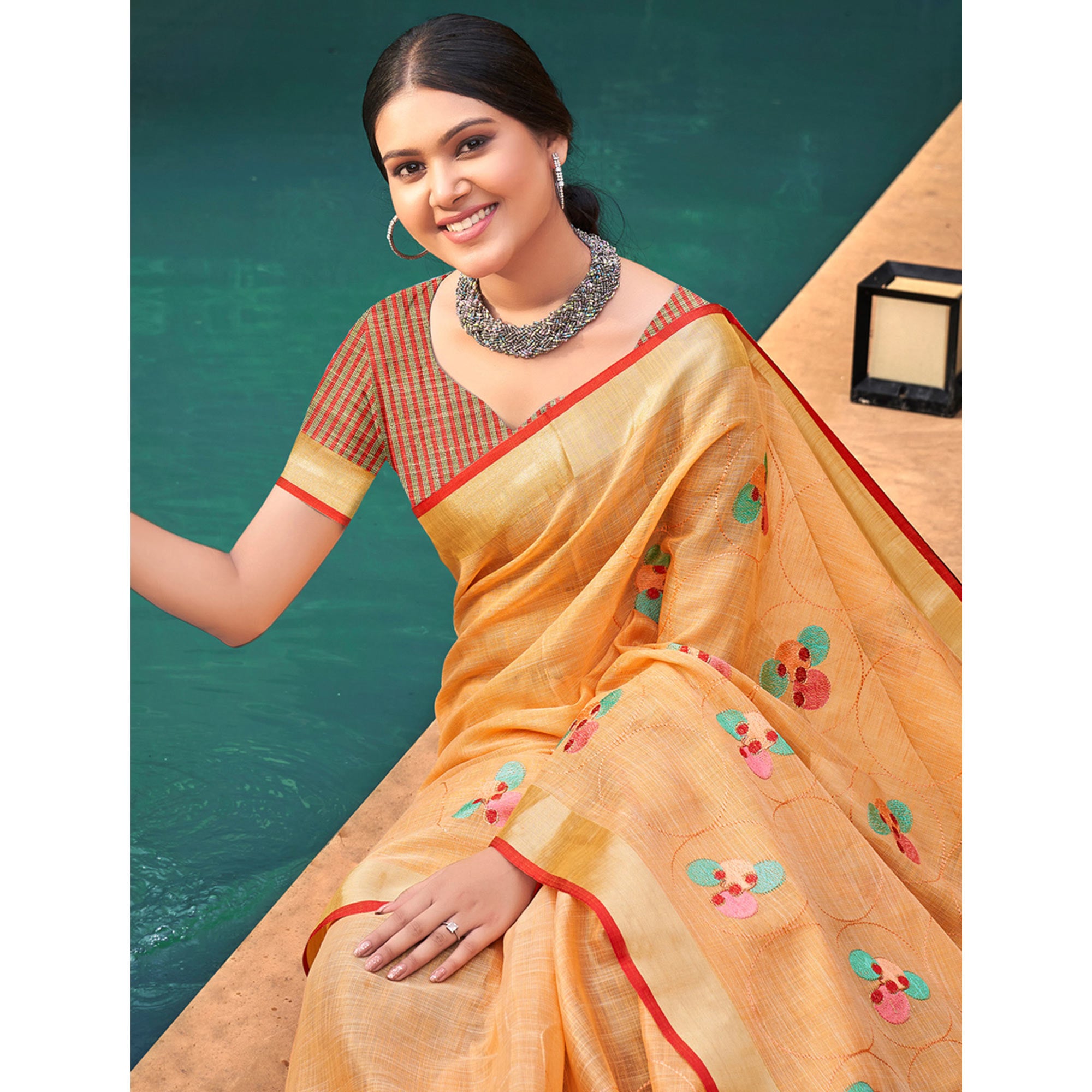 Orange Floral Embroidered Linen Saree With Tassels