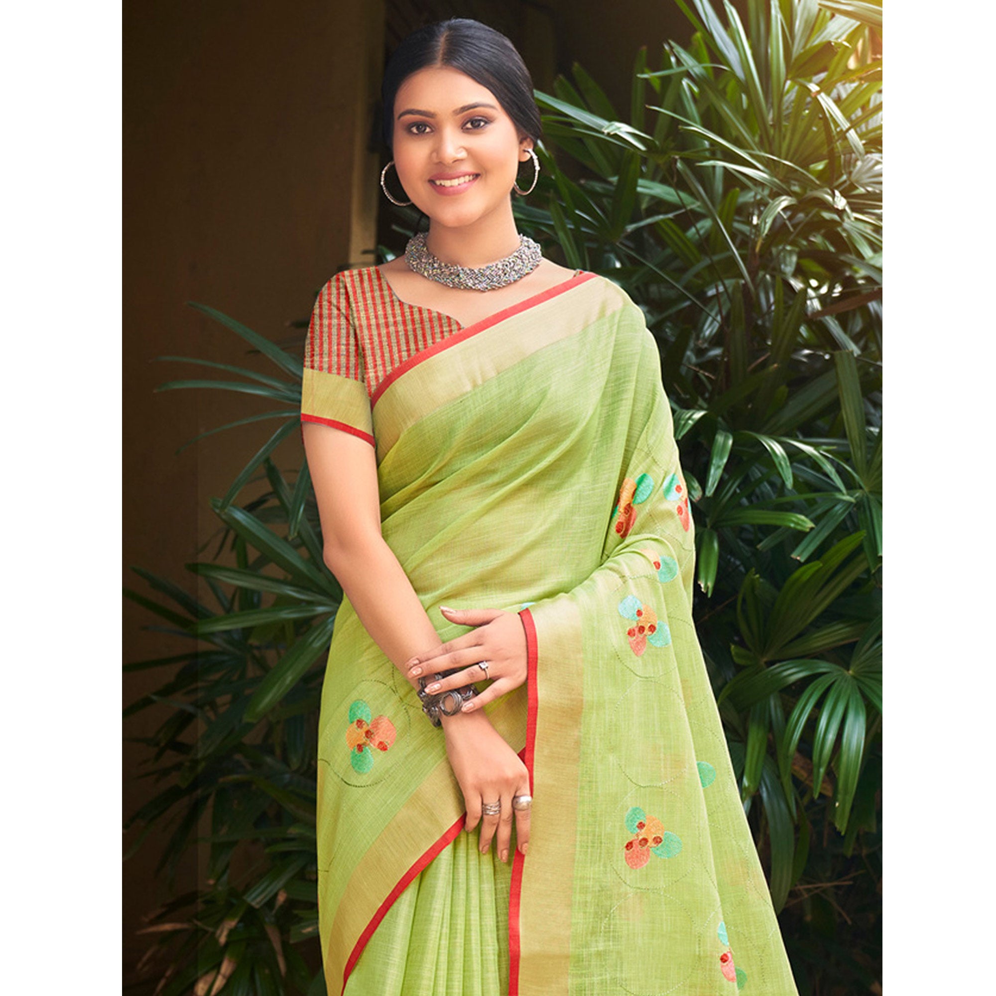 Green Floral Embroidered Linen Saree With Tassels