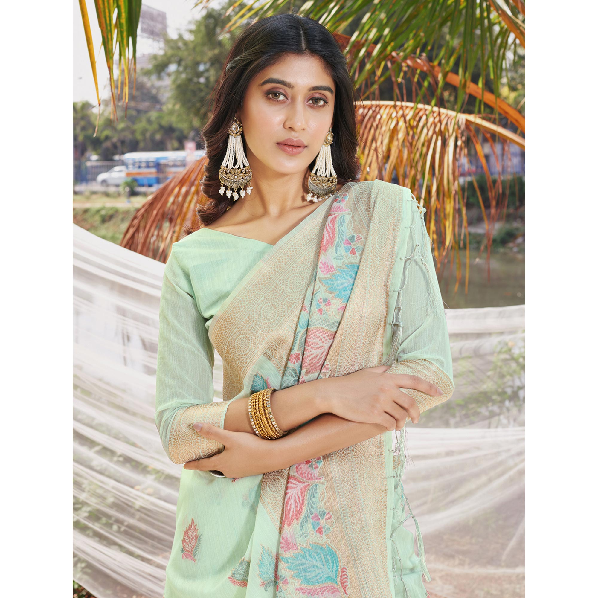 Sea Green Floral Woven Cotton Silk Saree With Tassels