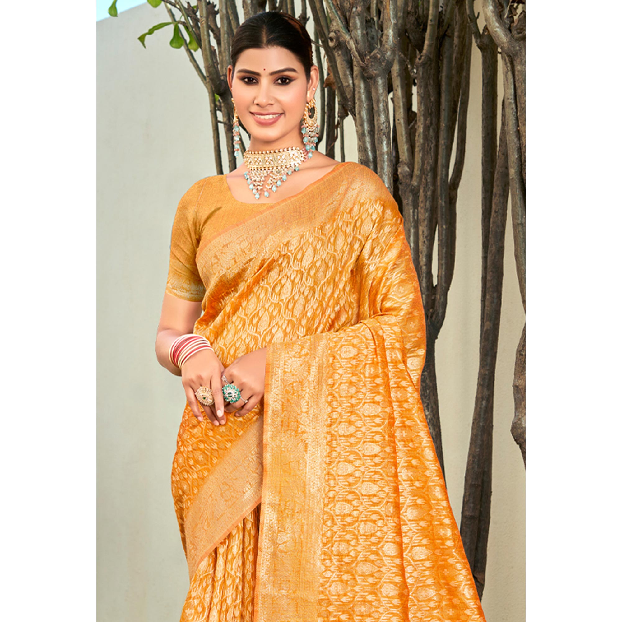 Mustard Floral Woven Cotton Blend Saree With Tassels