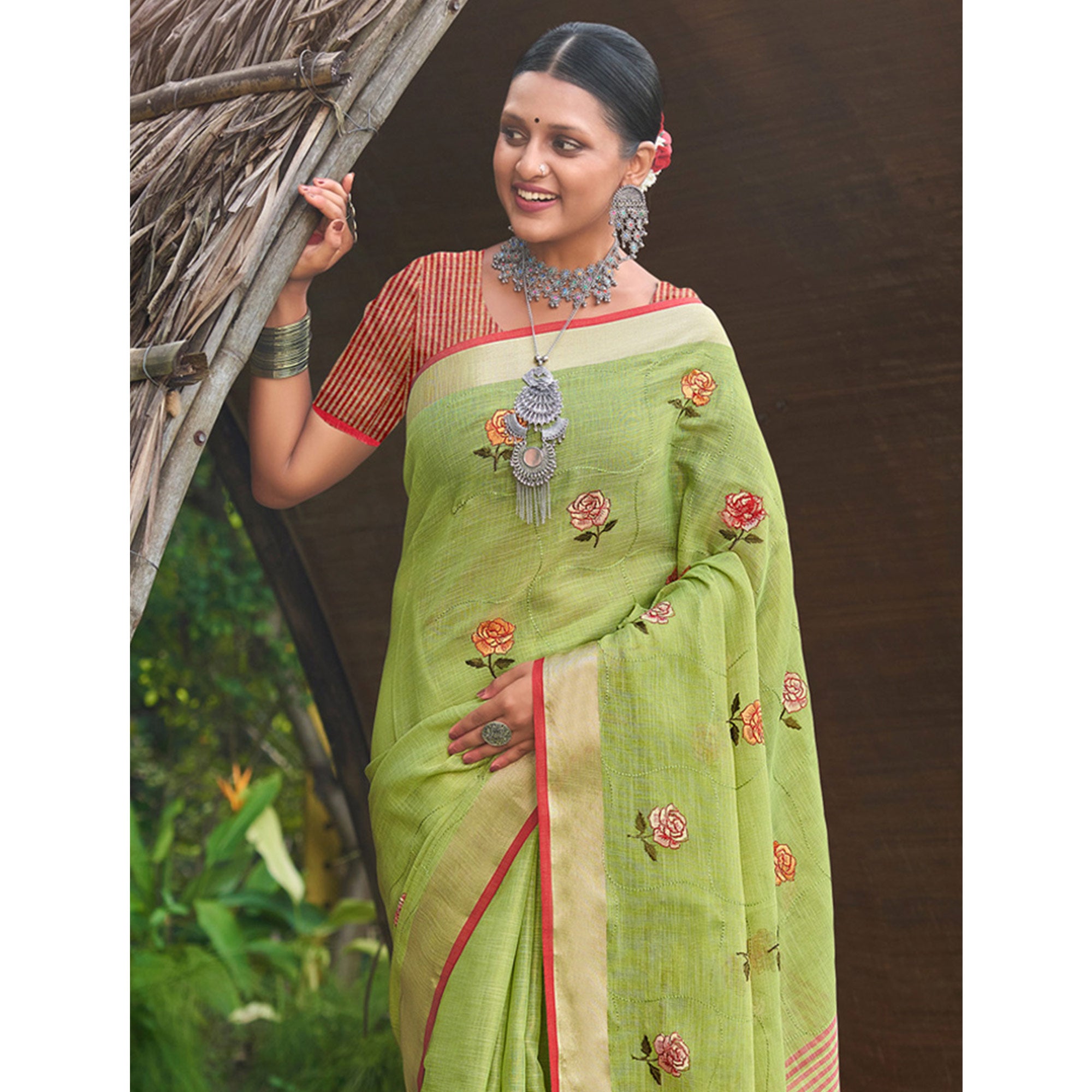 Green Floral Embroidered Linen Saree With Tassels