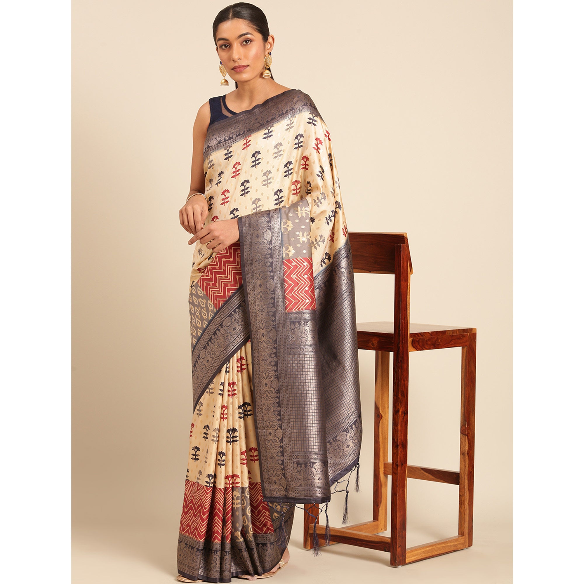 Cream Woven Banarasi Silk Saree With Tassels