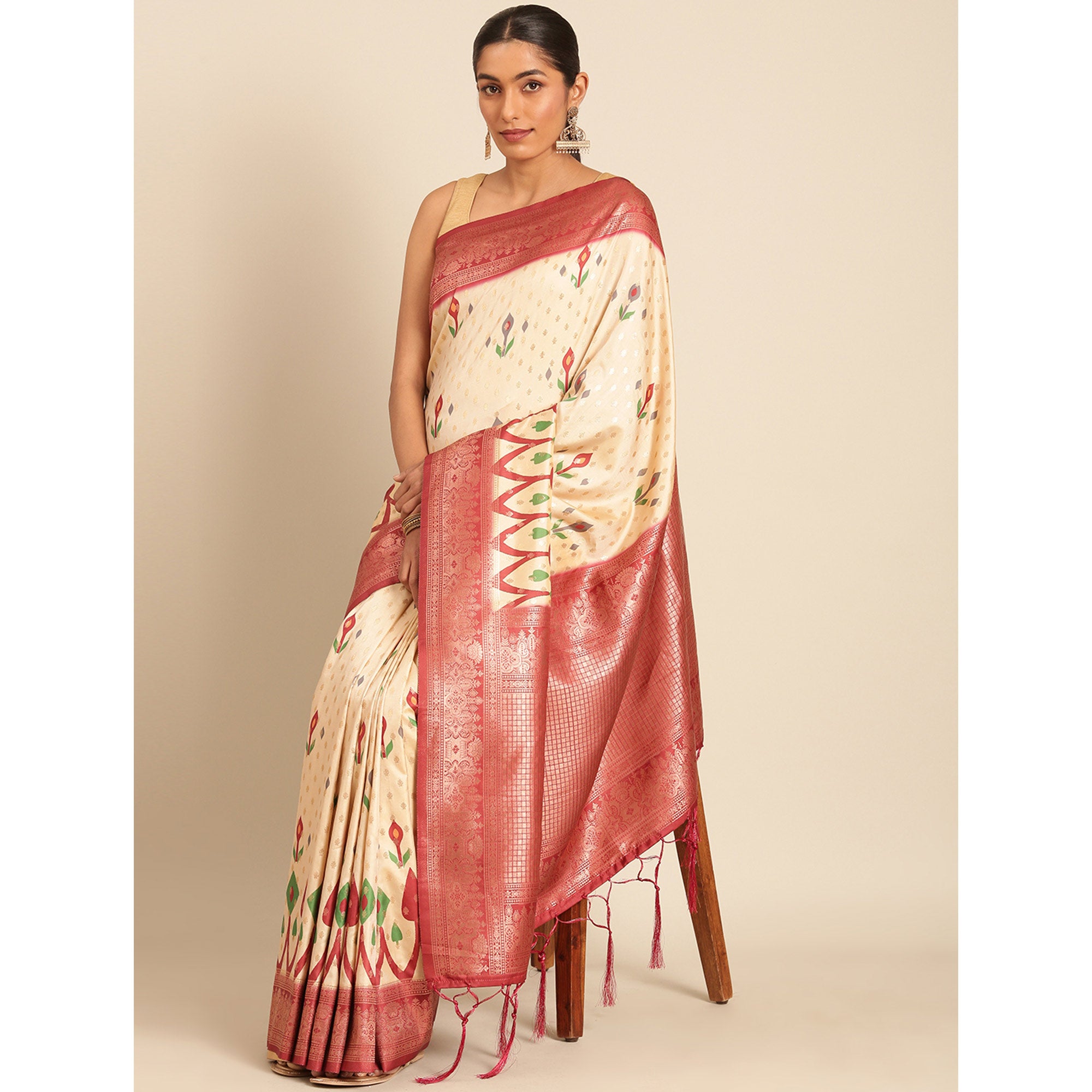 Cream Woven Banarasi Silk Saree With Tassels