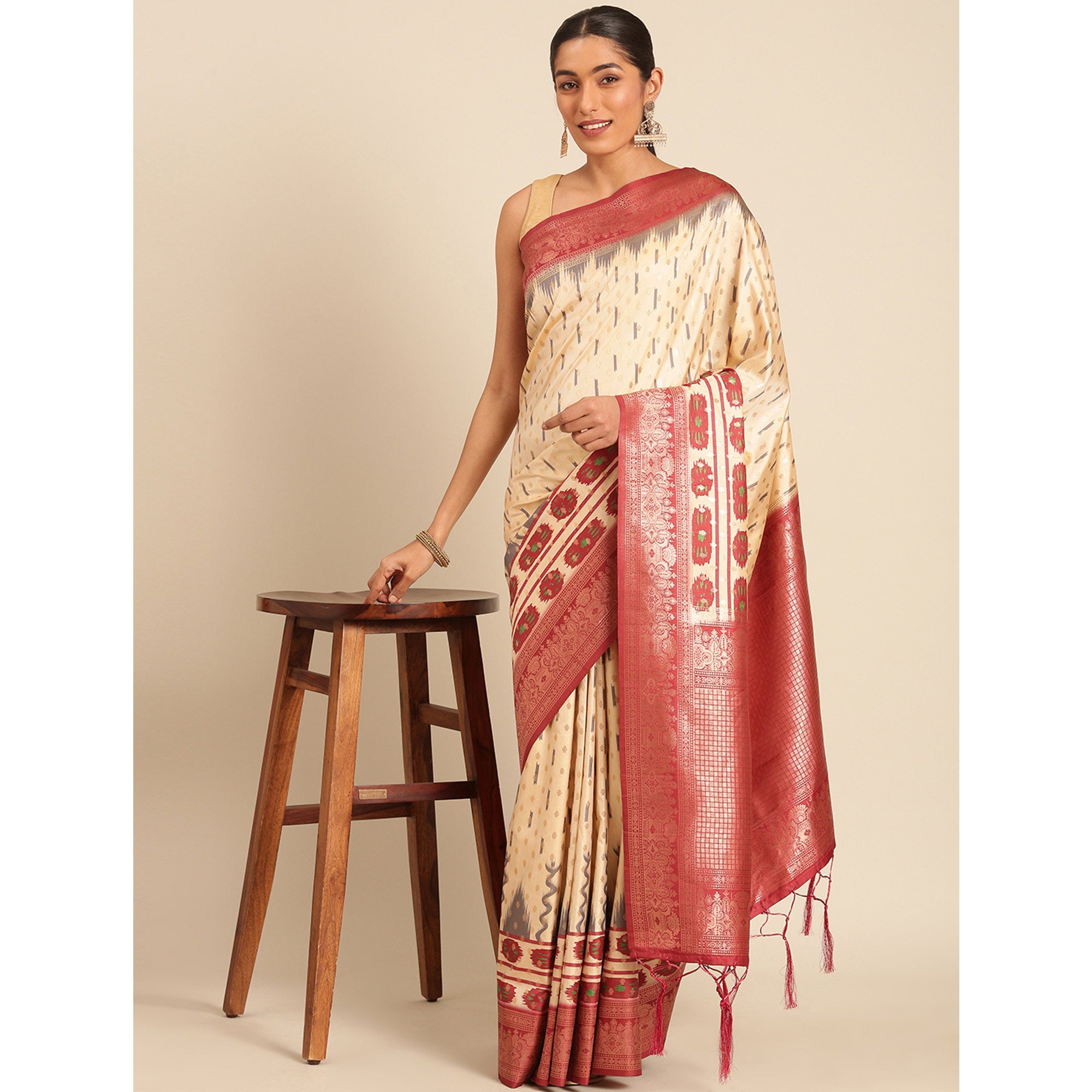 Cream Woven Banarasi Silk Saree With Tassels