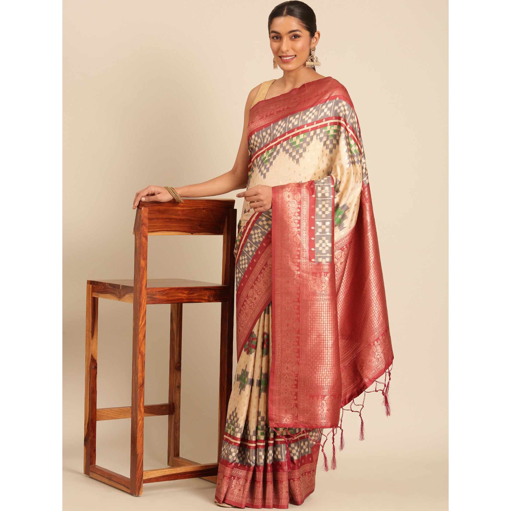 Cream Woven Banarasi Silk Saree With Tassels