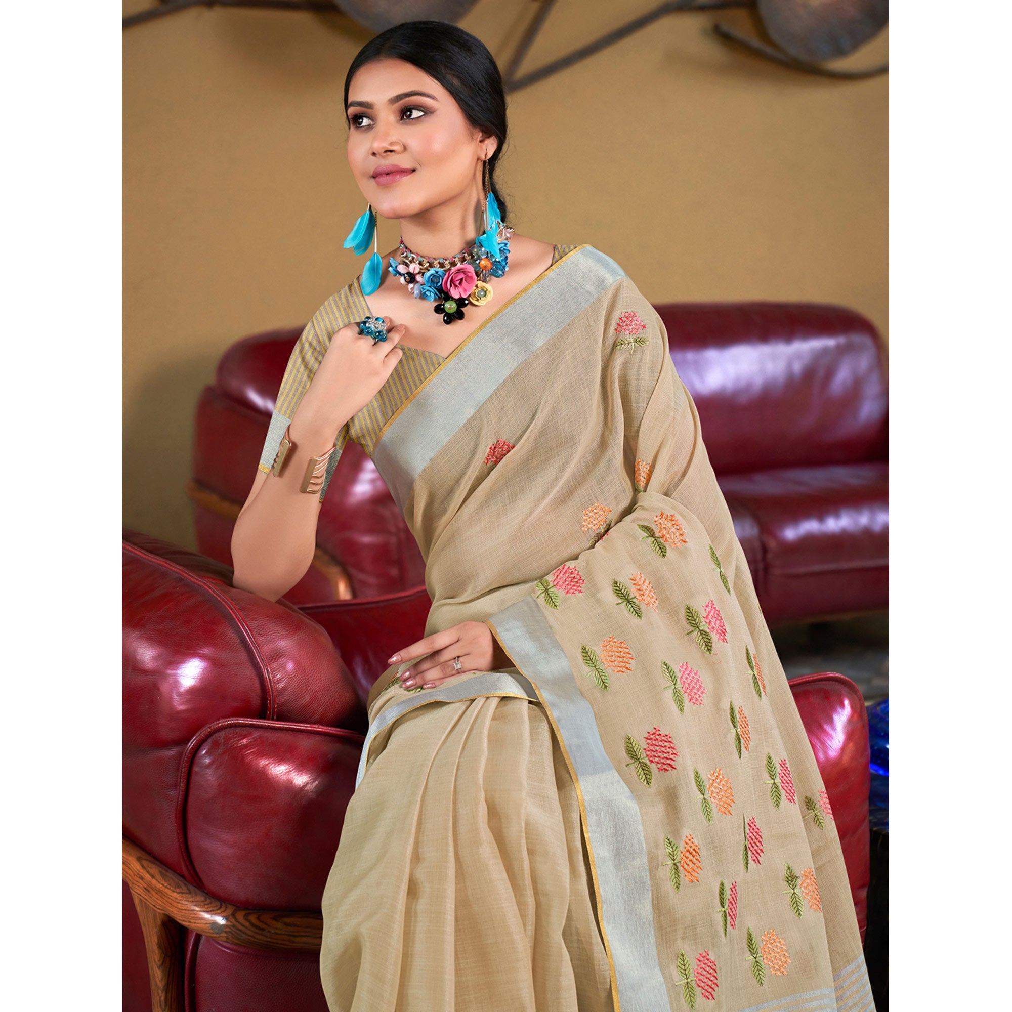 Beige Floral Embroidered Linen Saree With Tassels