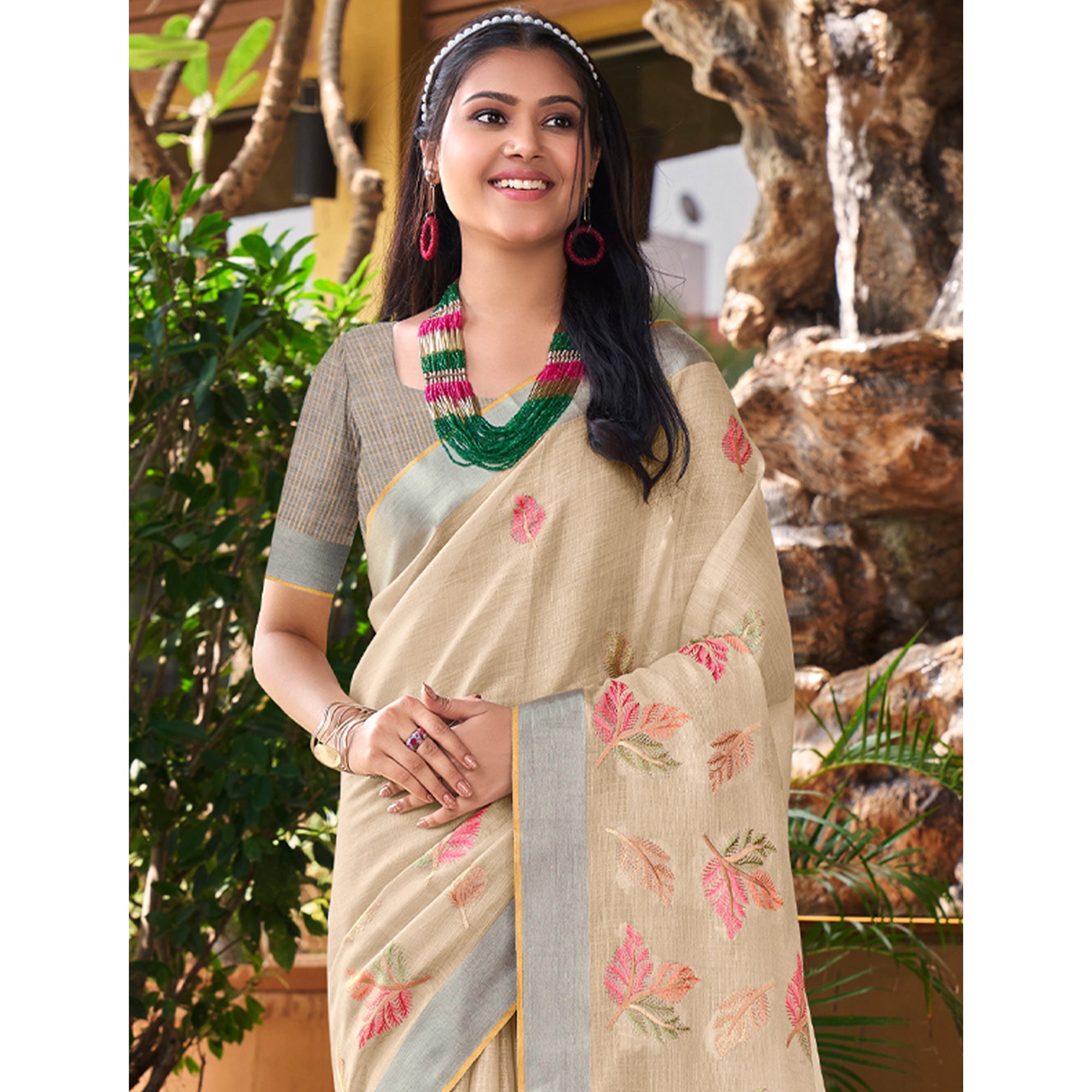 Beige Floral Embroidered Linen Saree With Tassels