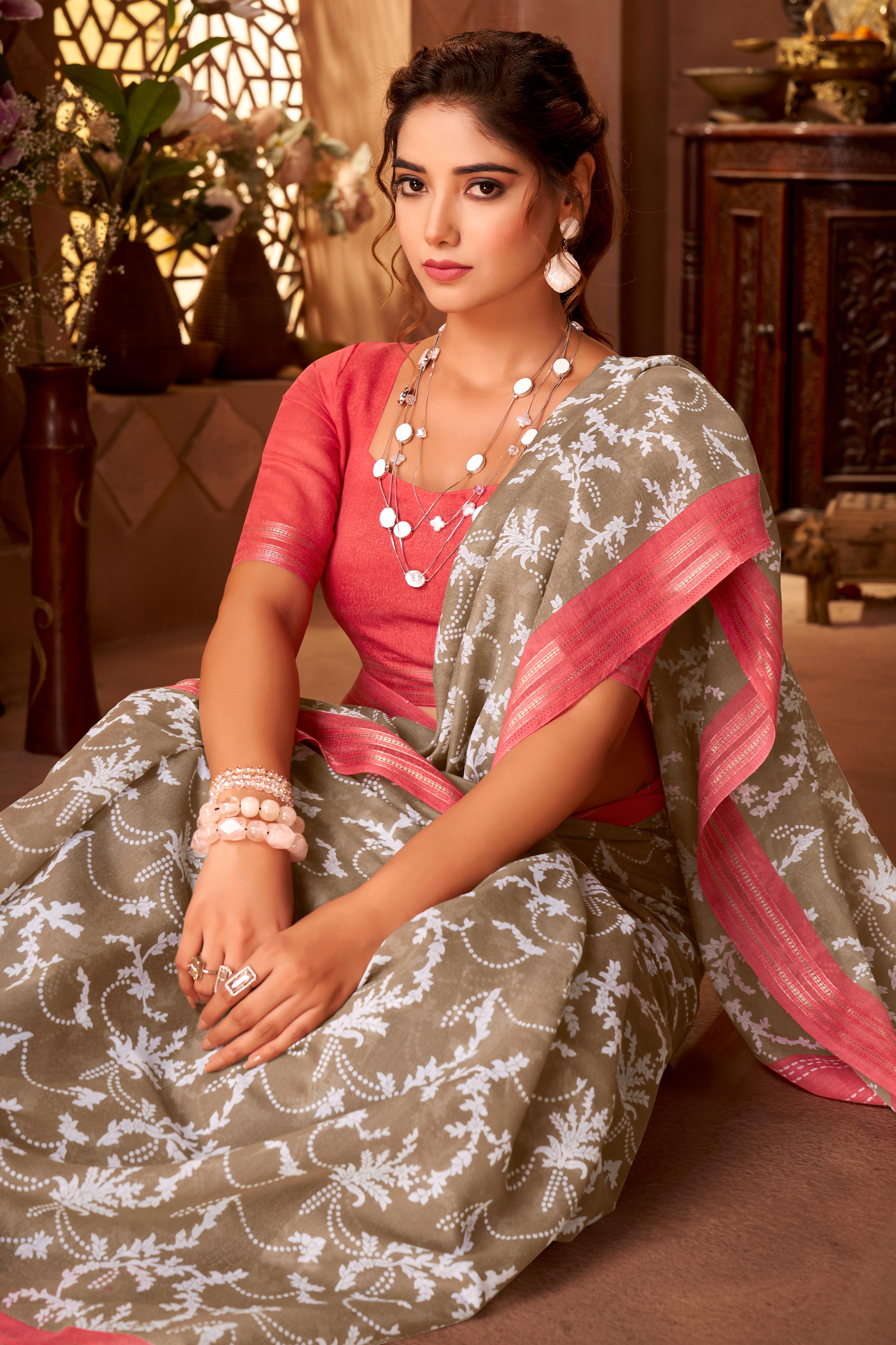 Sophisticated Brown Mulmul Cotton Saree Featuring Delicate Floral Prints & Weaving Border