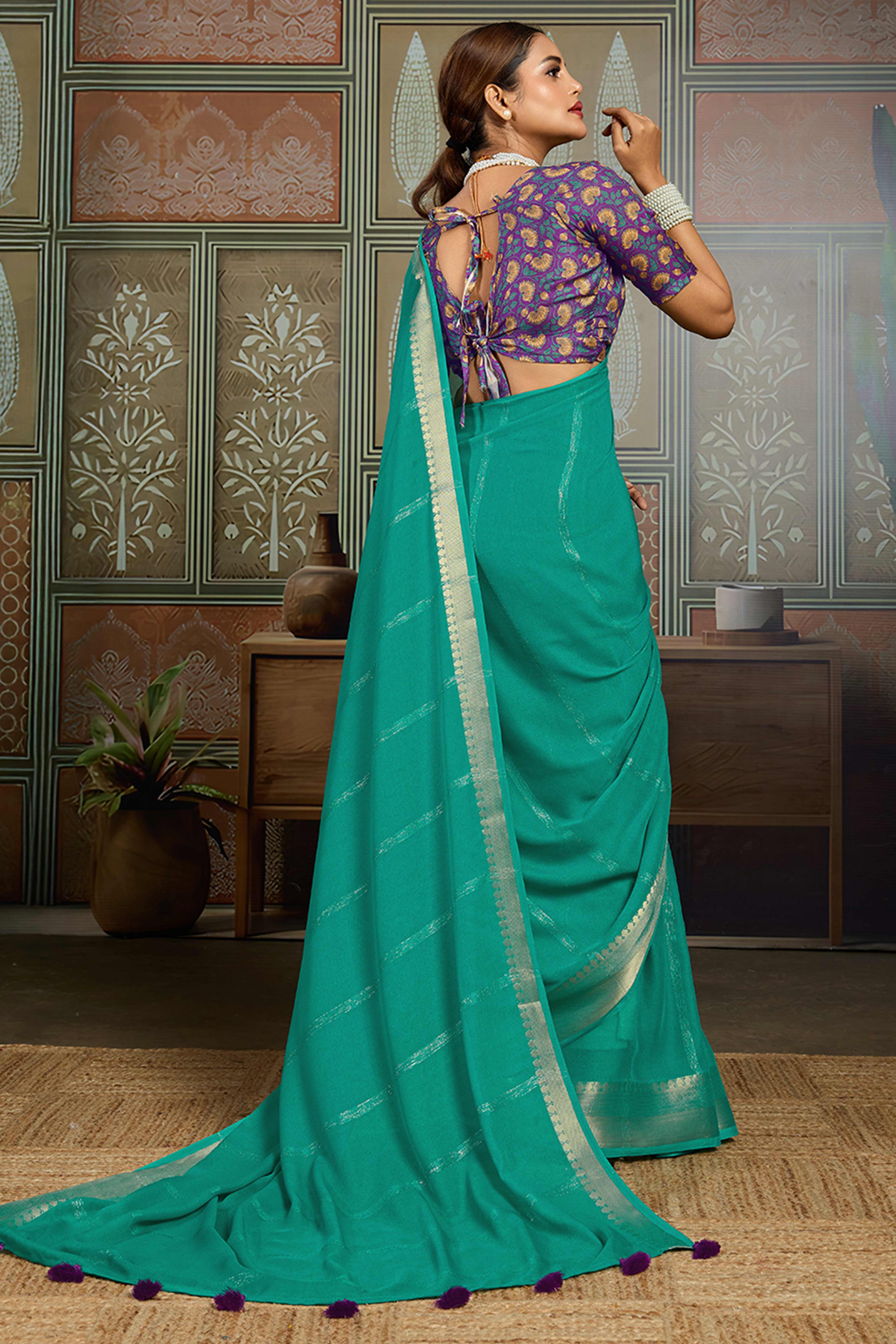 Rama Green Striped Pattern Bemberg Saree Adorned With Intricate Zari Weaving & Graceful Tassel Pallu