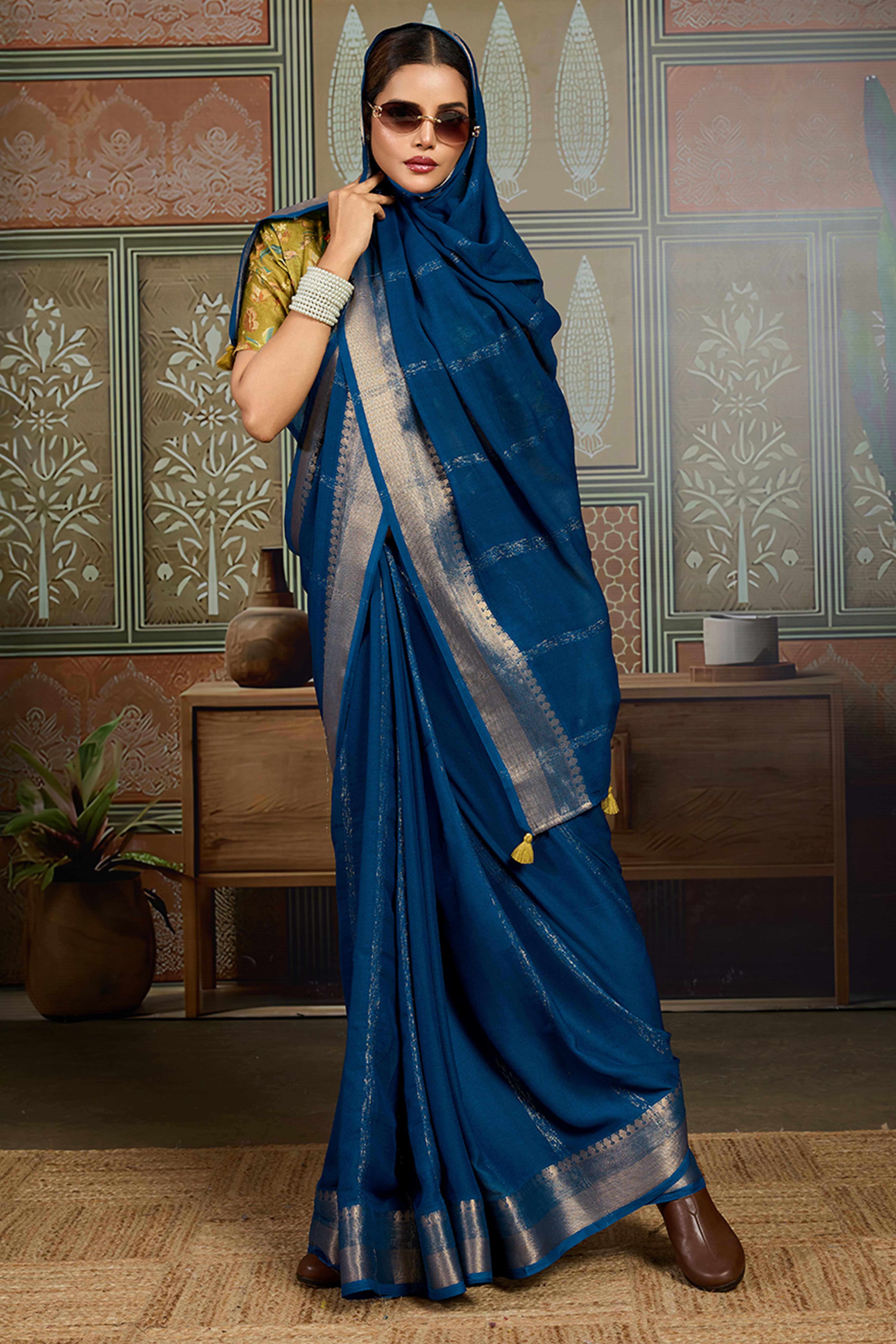 Blue Striped Pattern Bemberg Saree Adorned With Intricate Zari Weaving & Graceful Tassel Pallu
