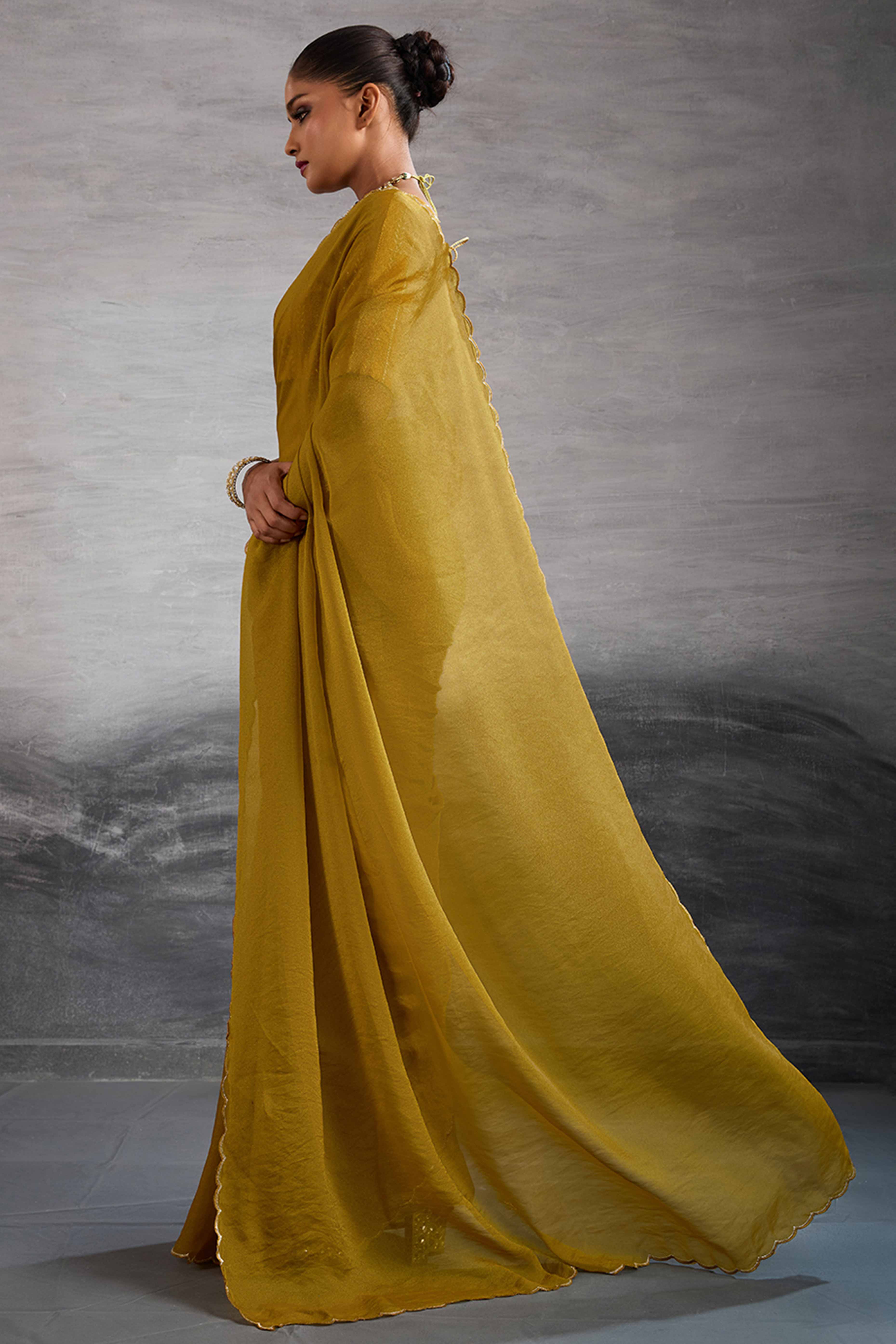 Mustard Solid Organza Jimmy Choo Saree Accentuated With Elegant Cutwork Border Detailing