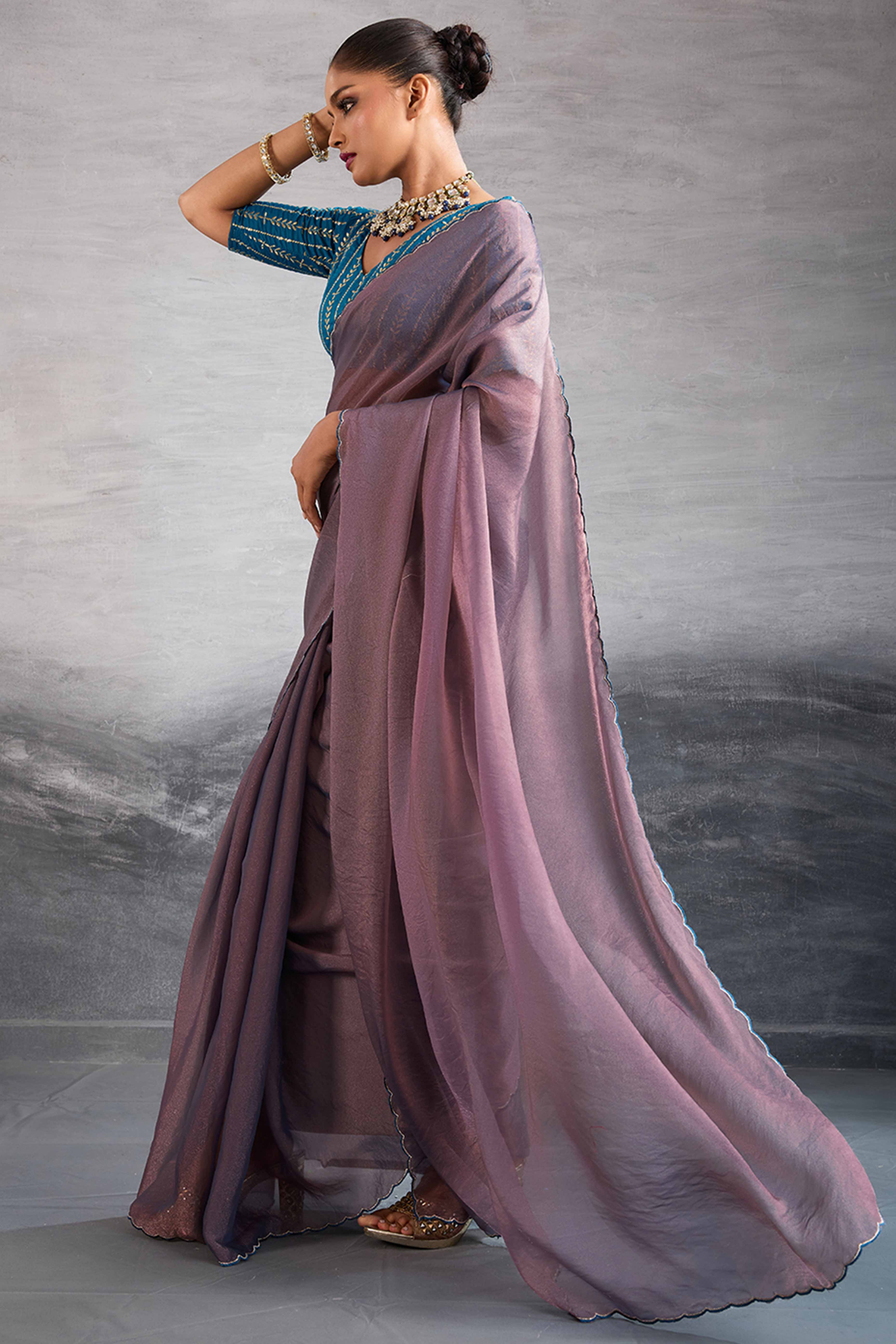 Mauve Solid Organza Jimmy Choo Saree Accentuated With Elegant Cutwork Border Detailing