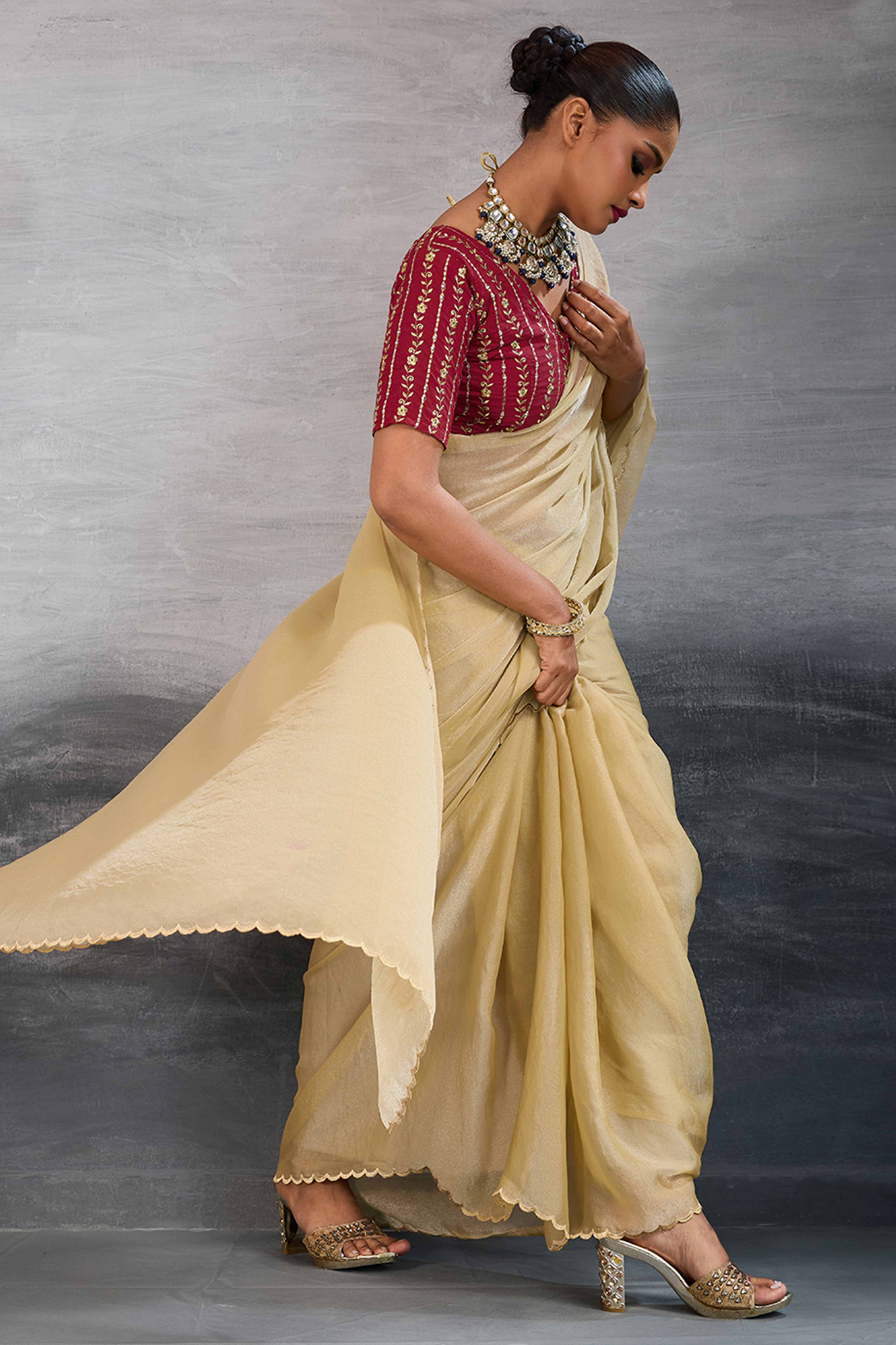 Cream Solid Organza Jimmy Choo Saree Accentuated With Elegant Cutwork Border Detailing