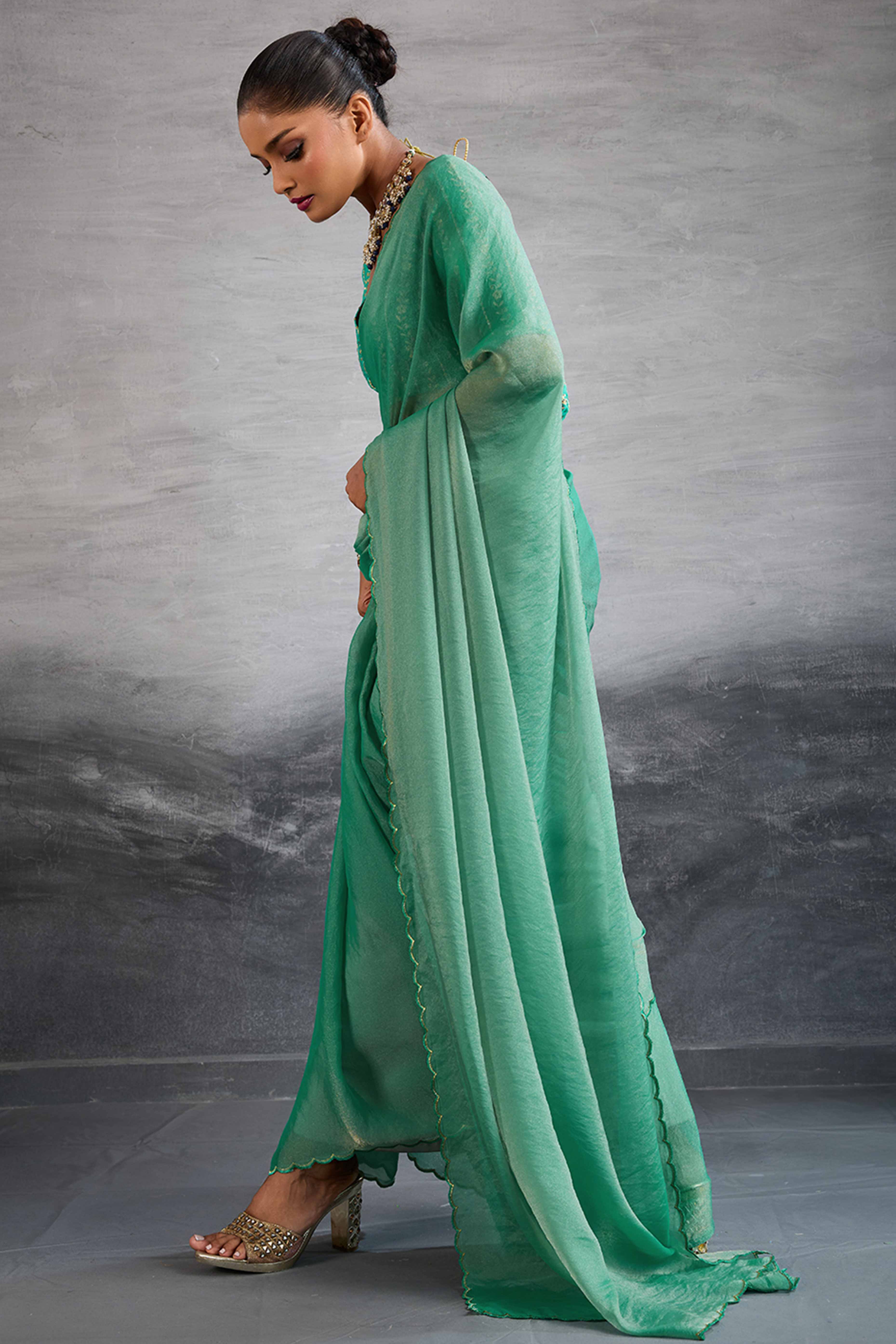 Green Solid Organza Jimmy Choo Saree Accentuated With Elegant Cutwork Border Detailing