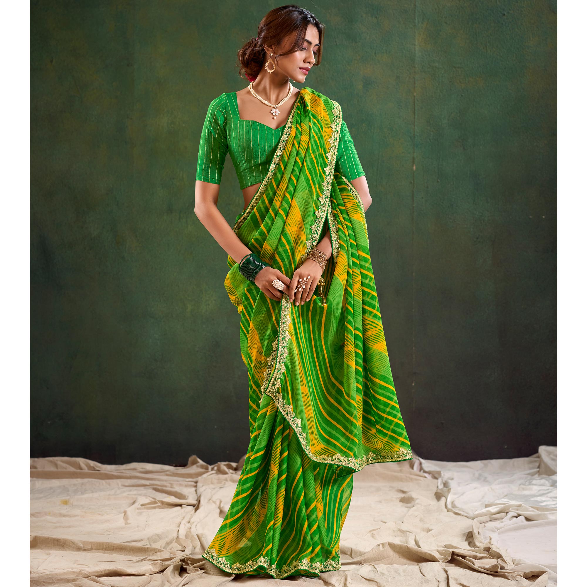 Green Printed Chiffon Saree With Sequins Border