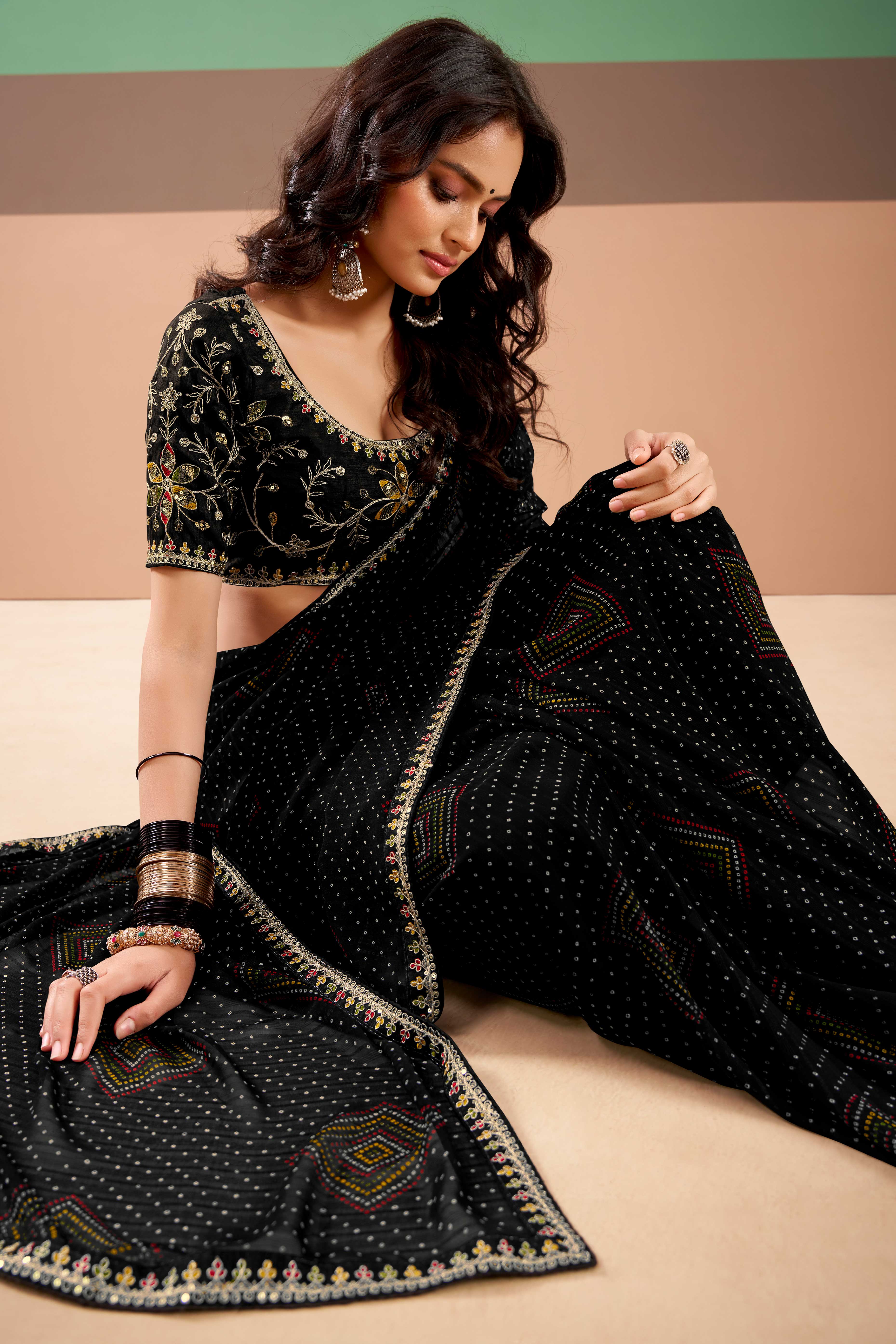 Charming Black Bandhani Printed Georgette Saree Adorned With Intricate Cording Embroidered Border