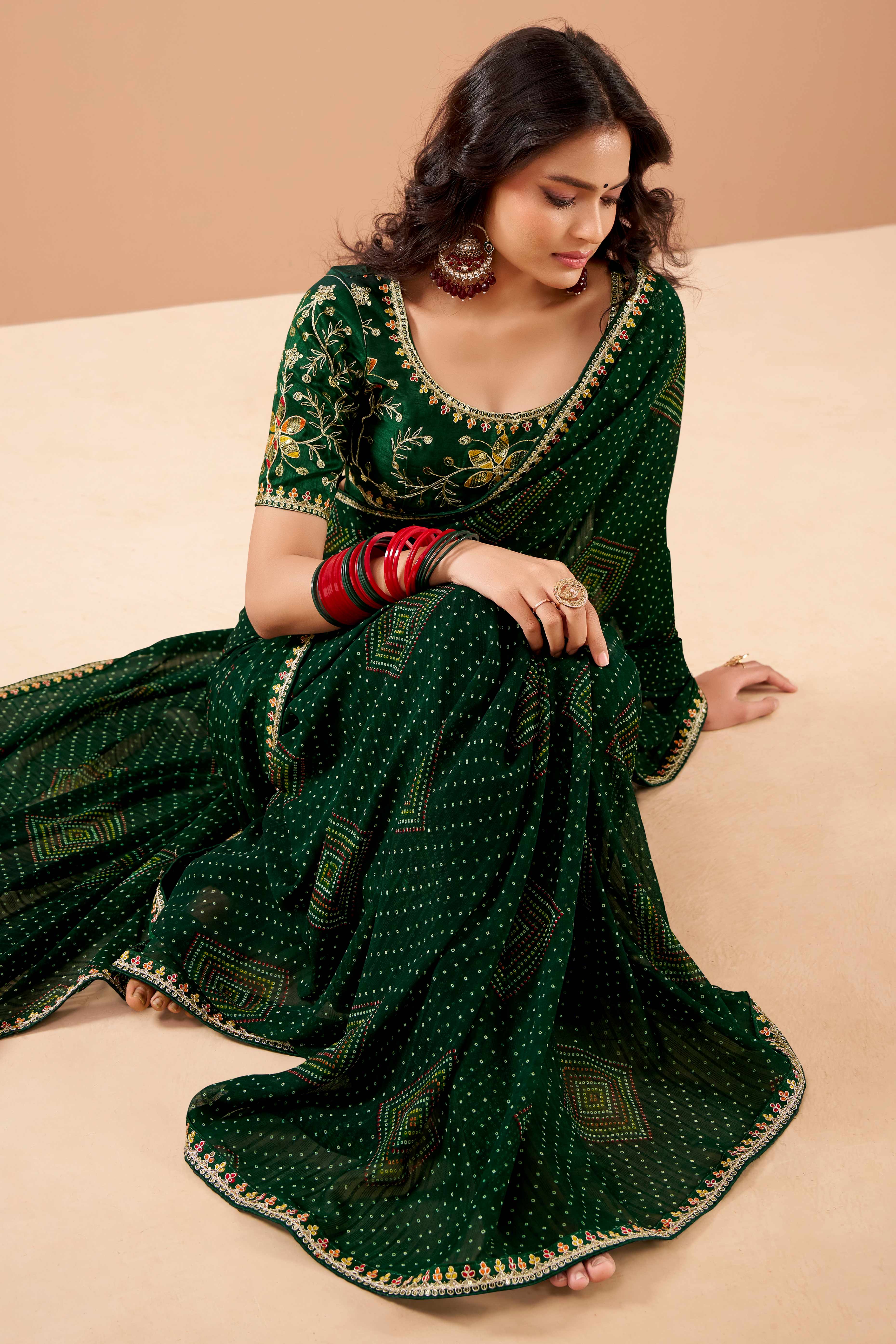 Charming Bottle Green Bandhani Printed Georgette Saree Adorned With Cording Embroidered Border