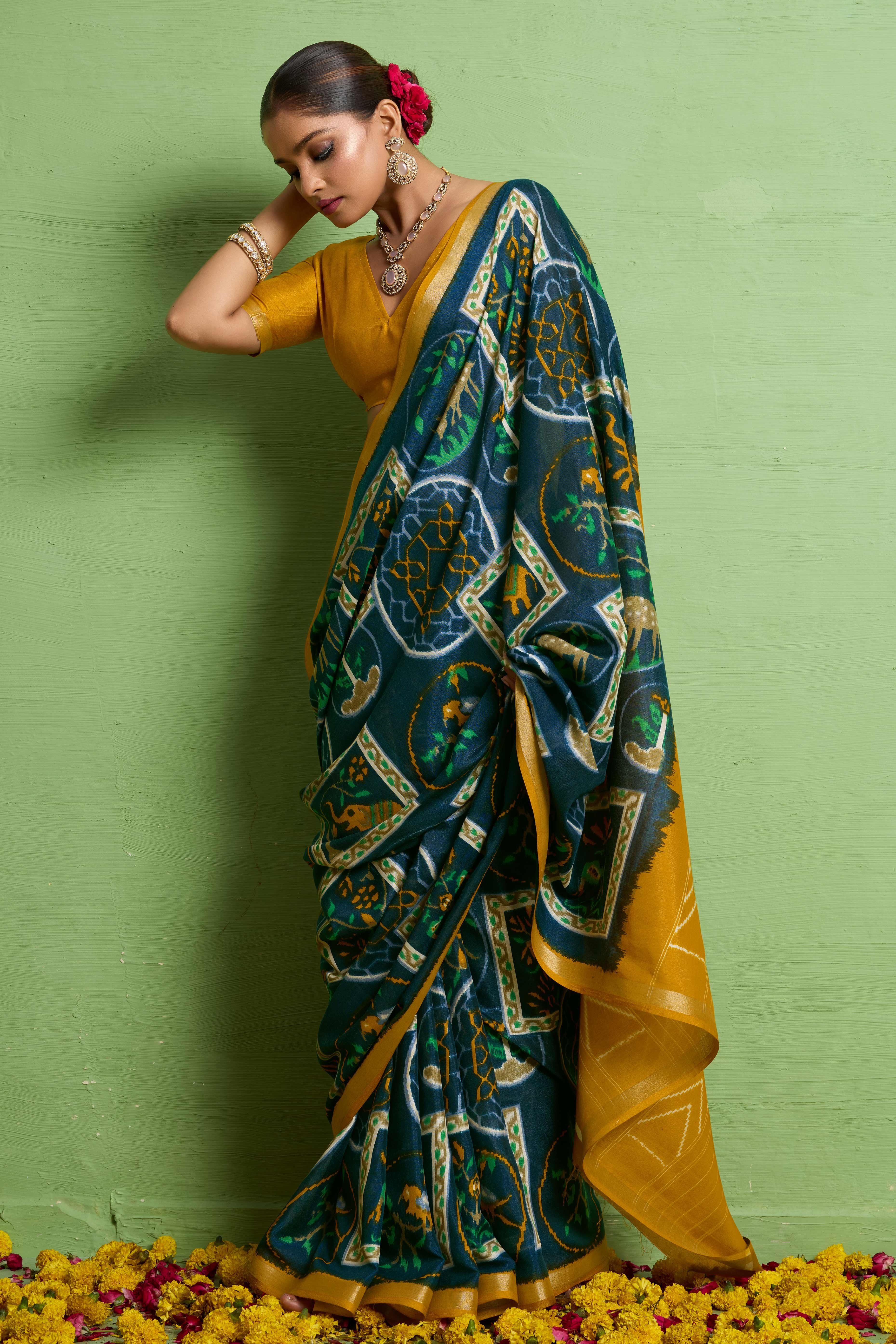 Traditional Morpich Blue Silk Blend Saree with Ikkat Print & Zari Edging
