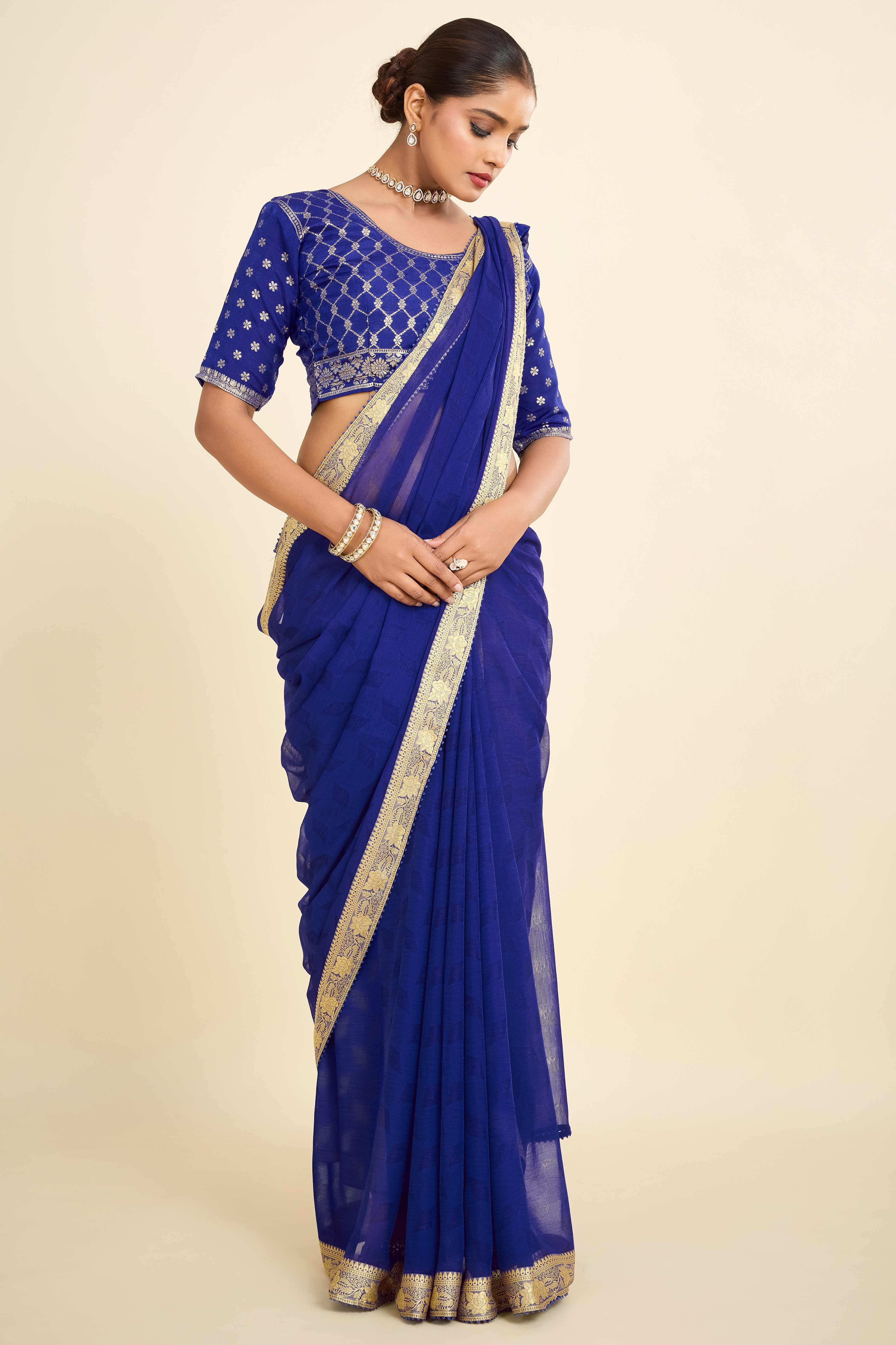 Blue Printed Chiffon Saree with Intricate Woven Edging