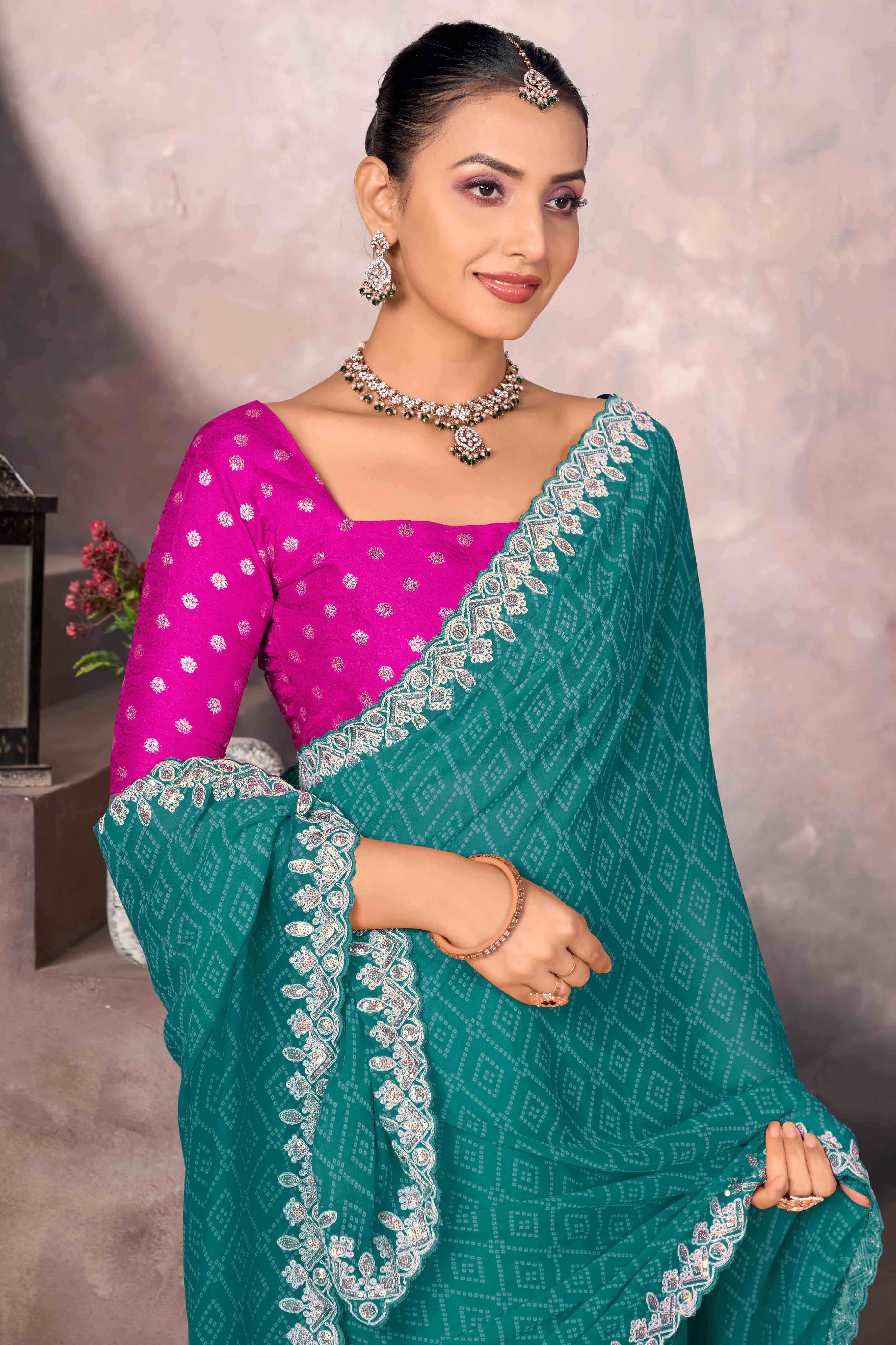 Modern Turquoise Georgette Saree with Timeless Bandhani Prints