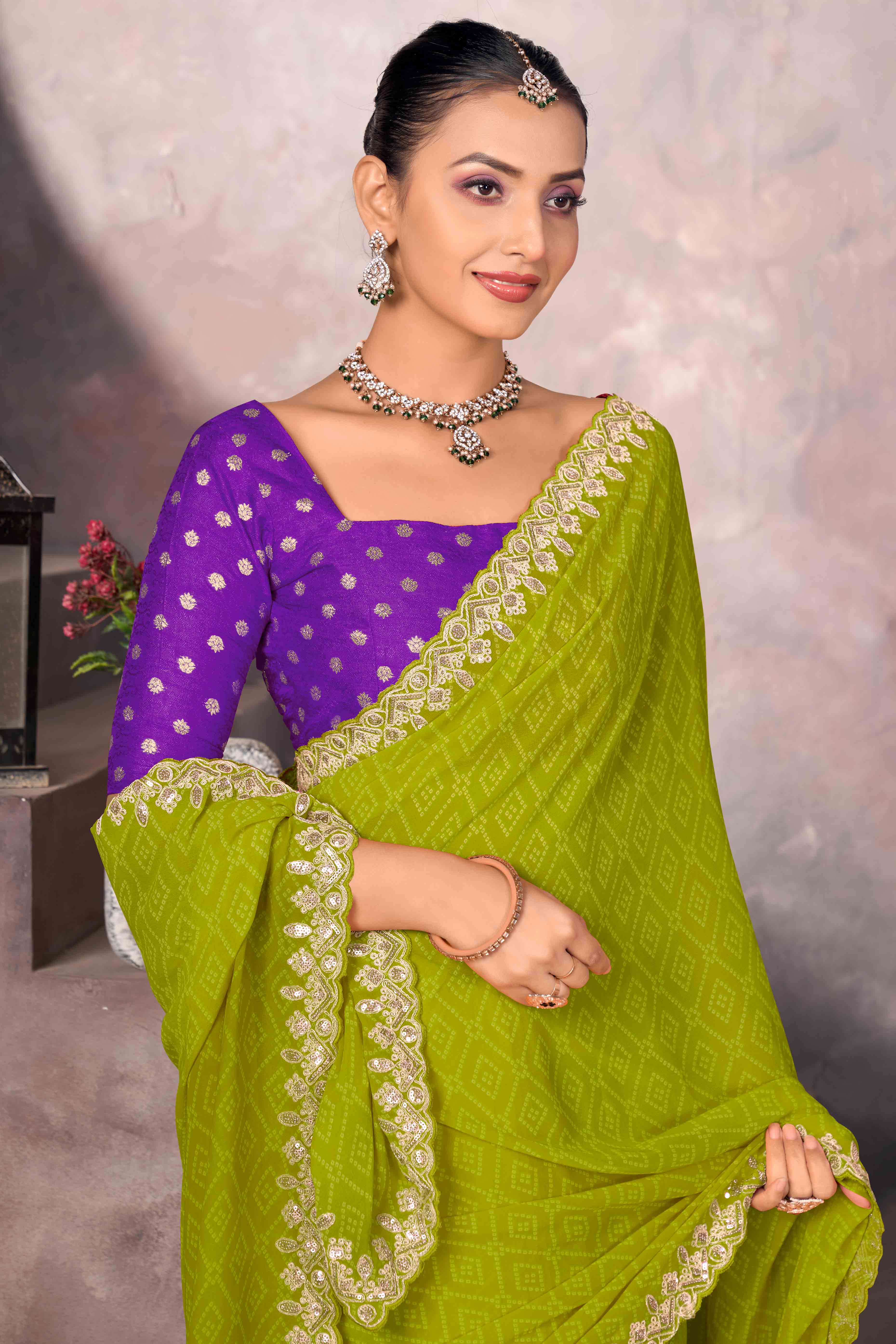 Modern Parrot Green Georgette Saree with Timeless Bandhani Prints