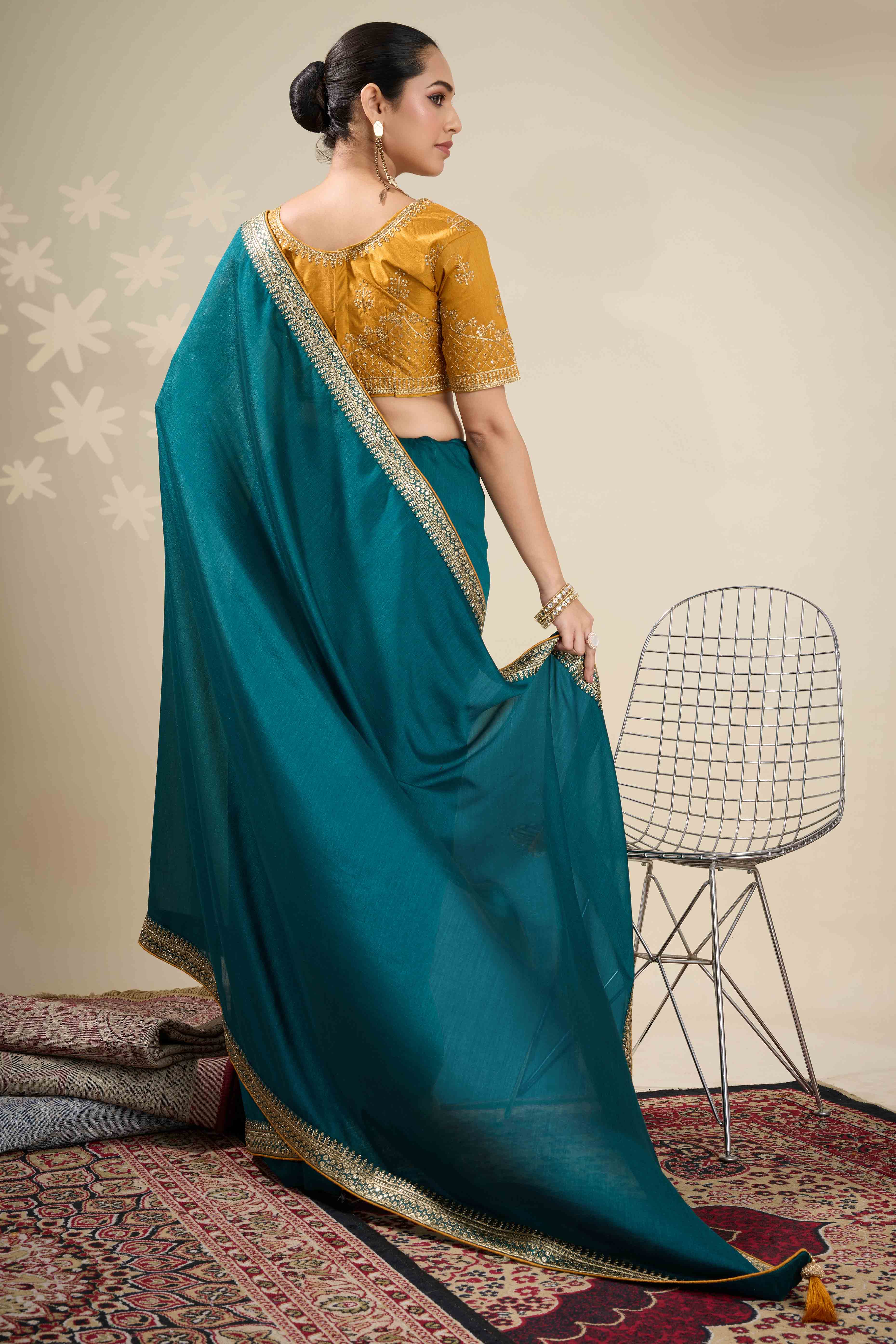 Graceful Vichitra Silk Saree in Teal with Embroidered Bordering