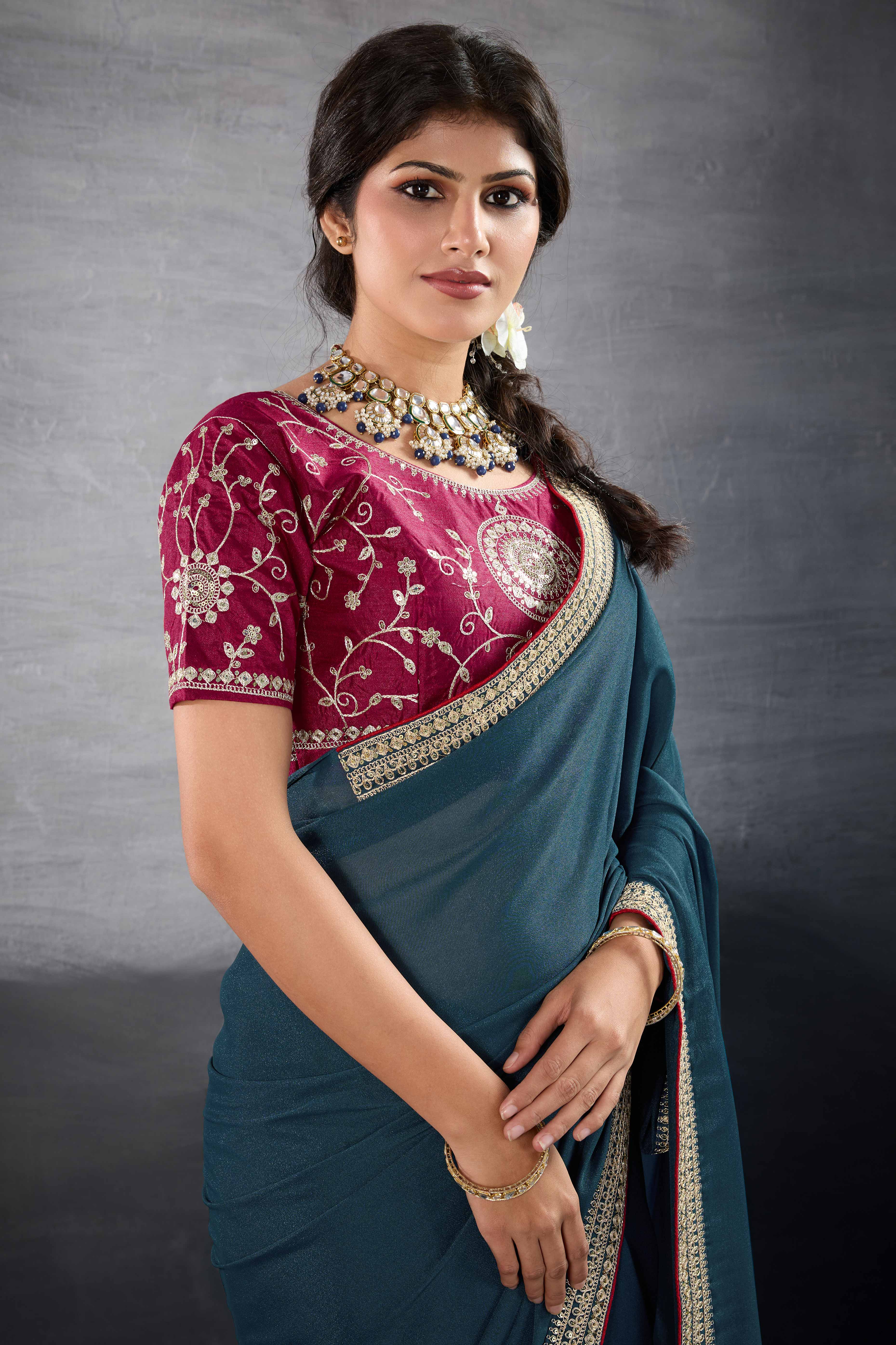 Teal Solid Saree In Georgette With Zari & Sequins Embroidery Border