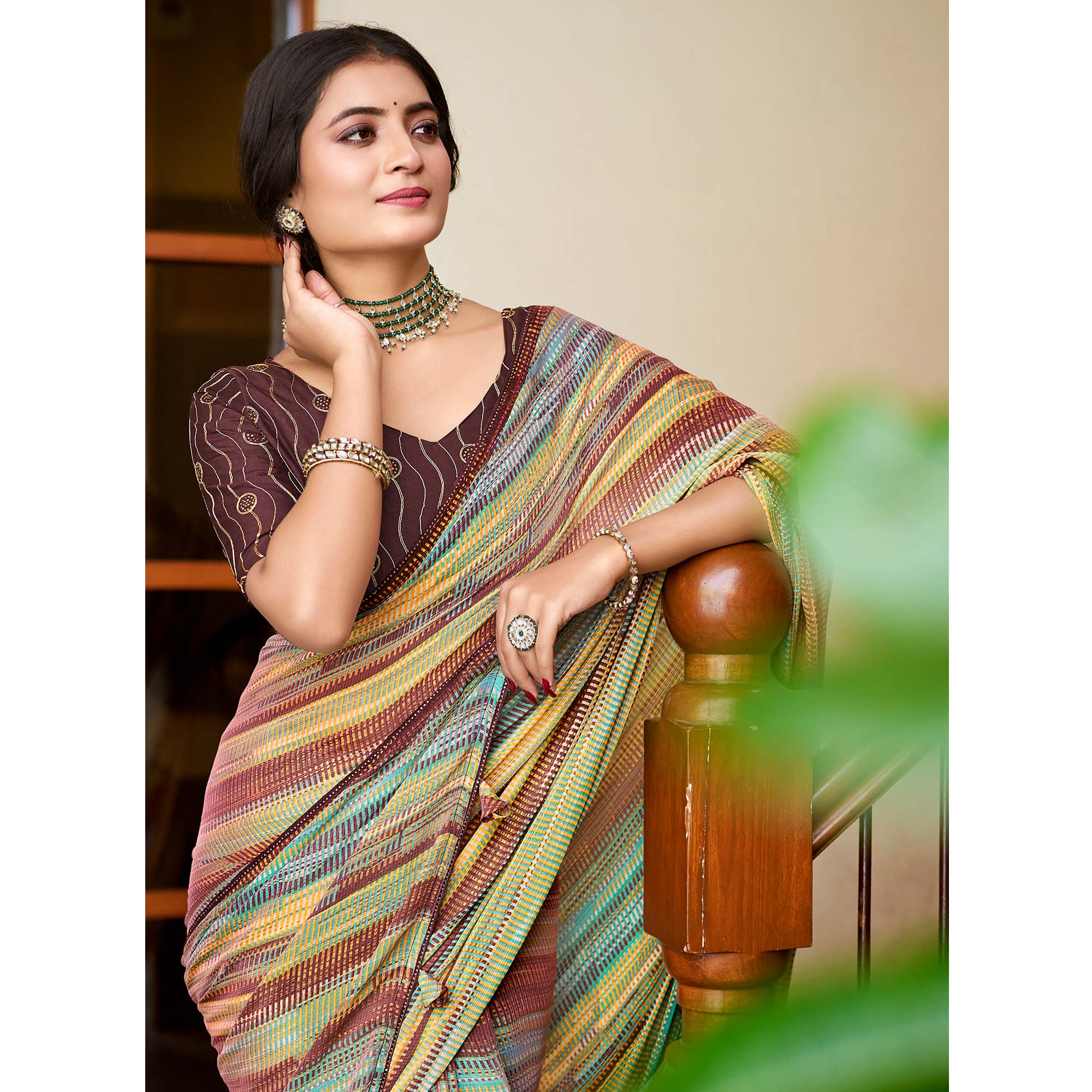 Brown Printed Chiffon Saree With Tassels