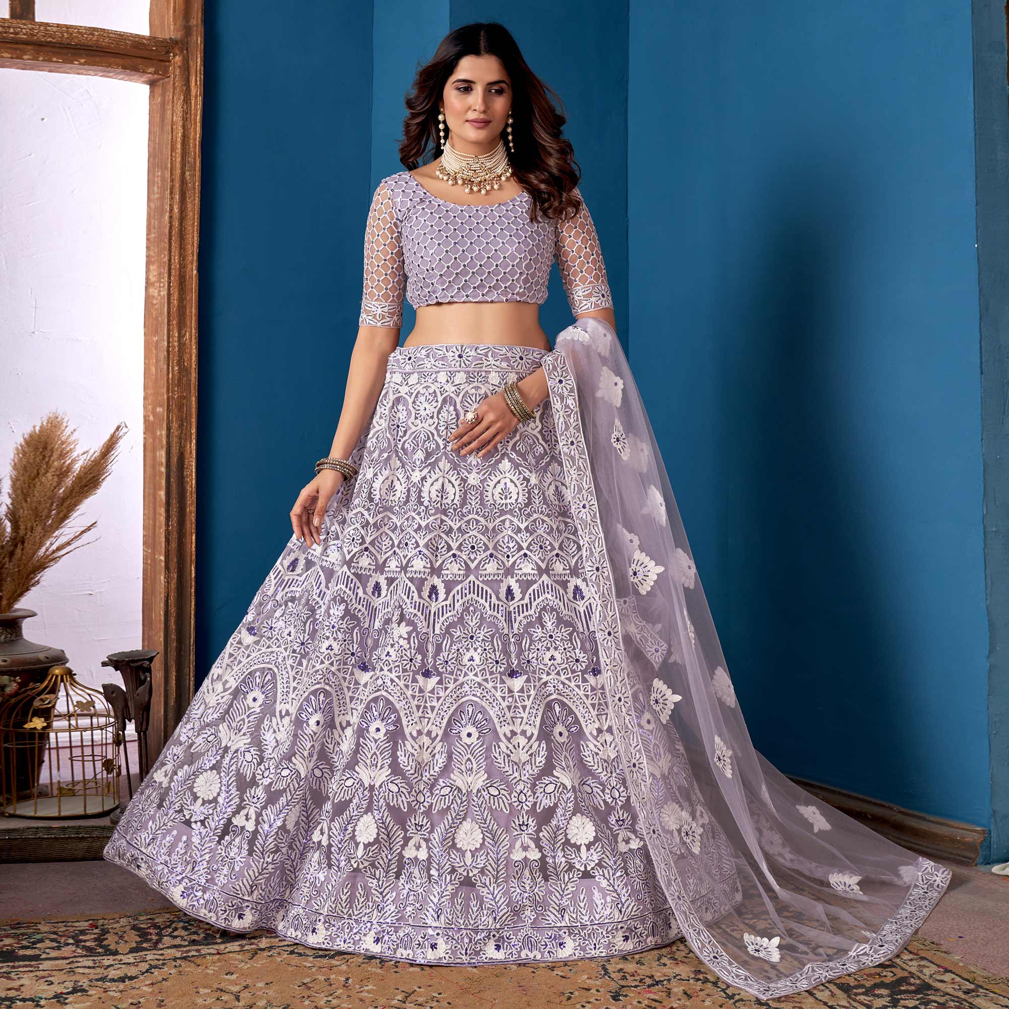 Purple Floral Sequins Embroidered Net Lehenga Choli