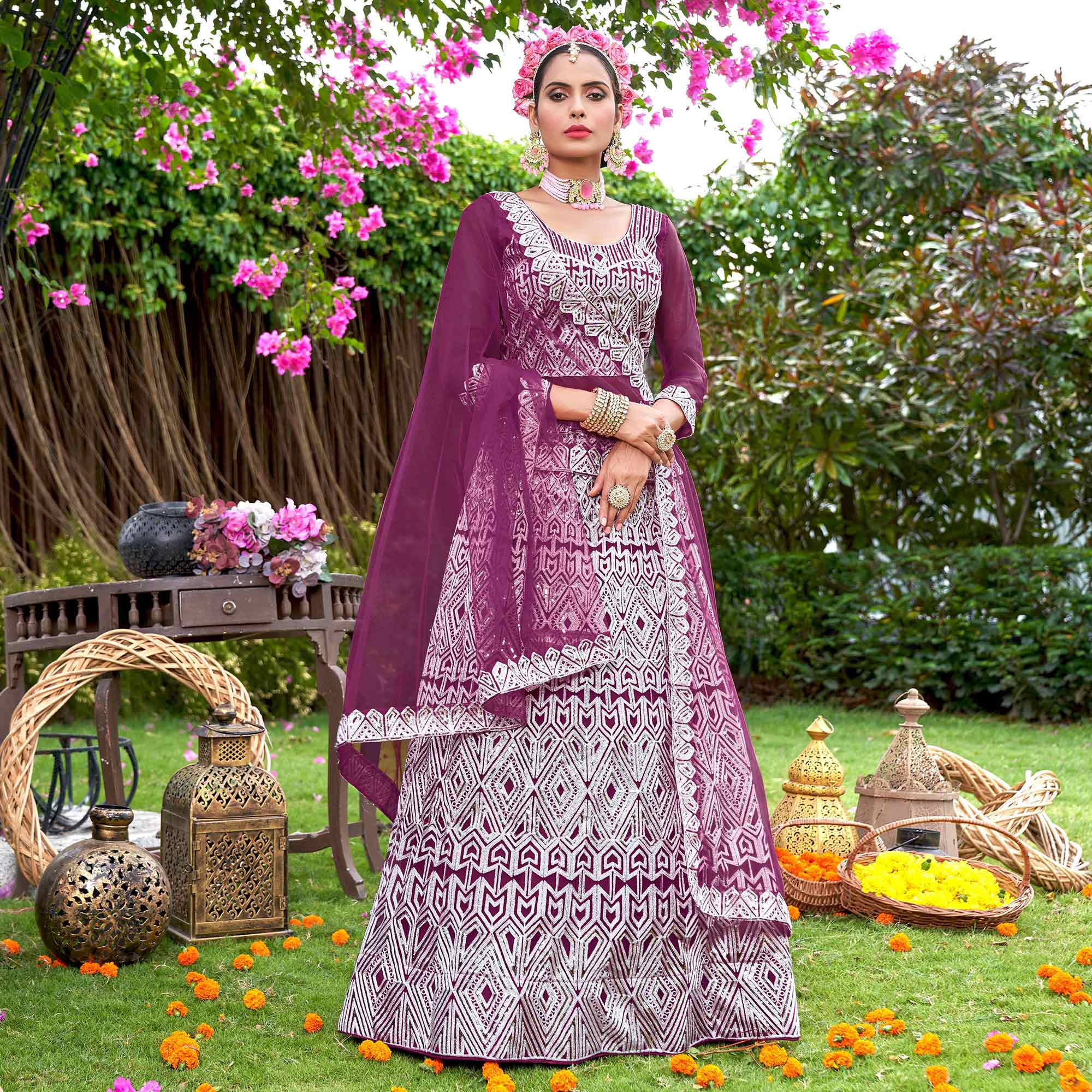 Wine Sequins Embroidered Net Semi Stitched Lehenga Choli