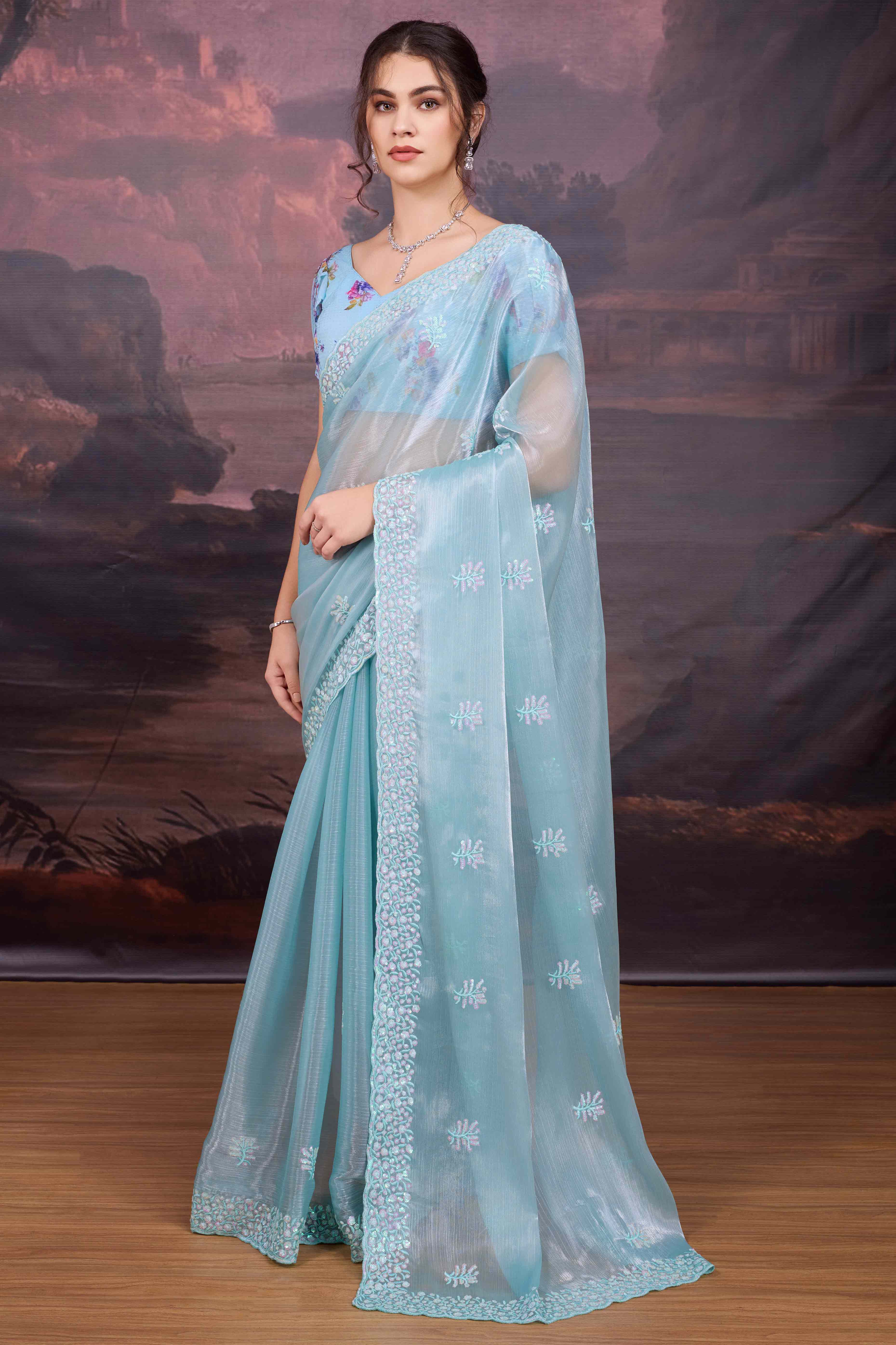 Sky Blue Organza Saree Enhanced with Elegant Sequins Embellishments