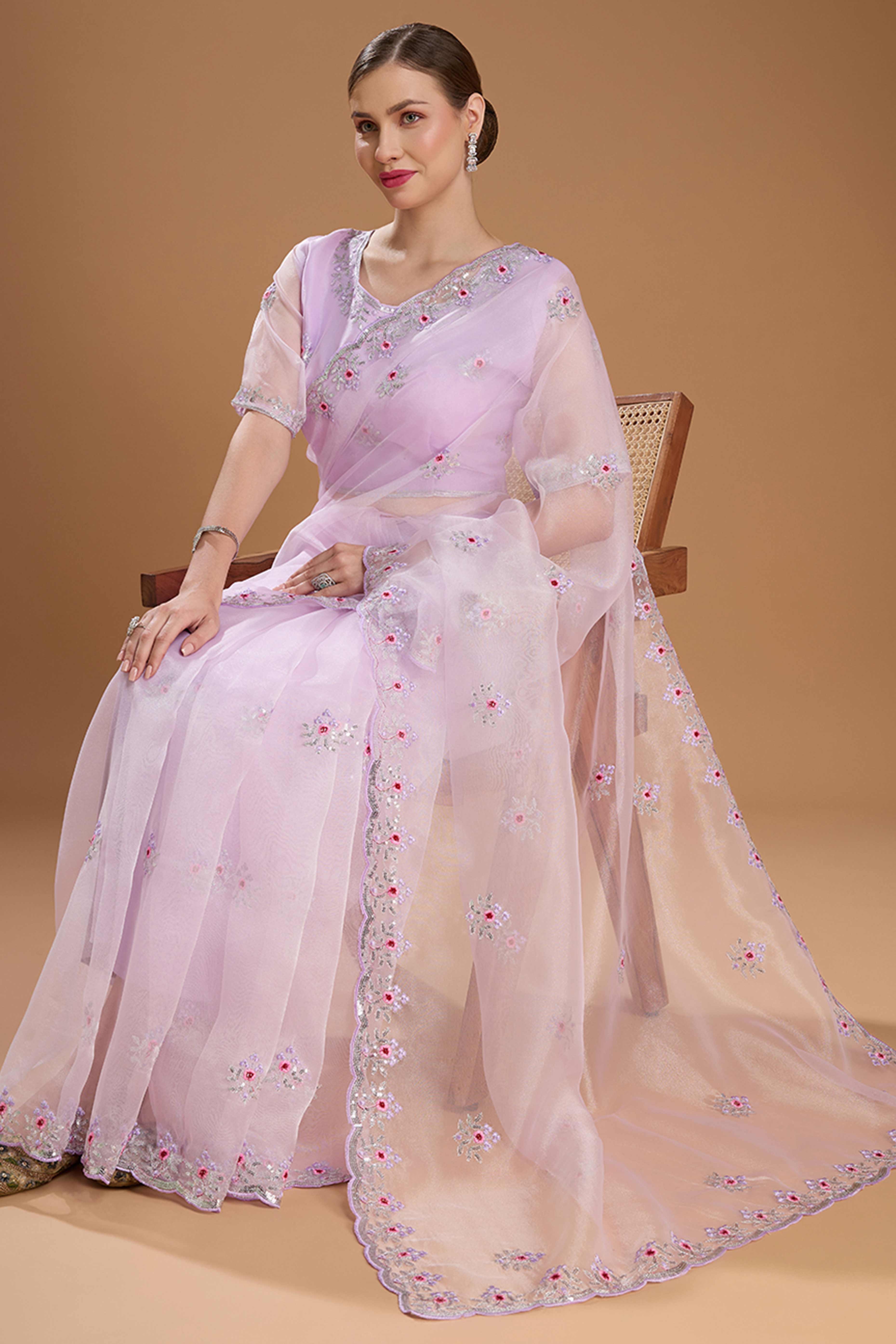 Light Lavender Net Saree Enhanced with Elegant Sequins Embellishments
