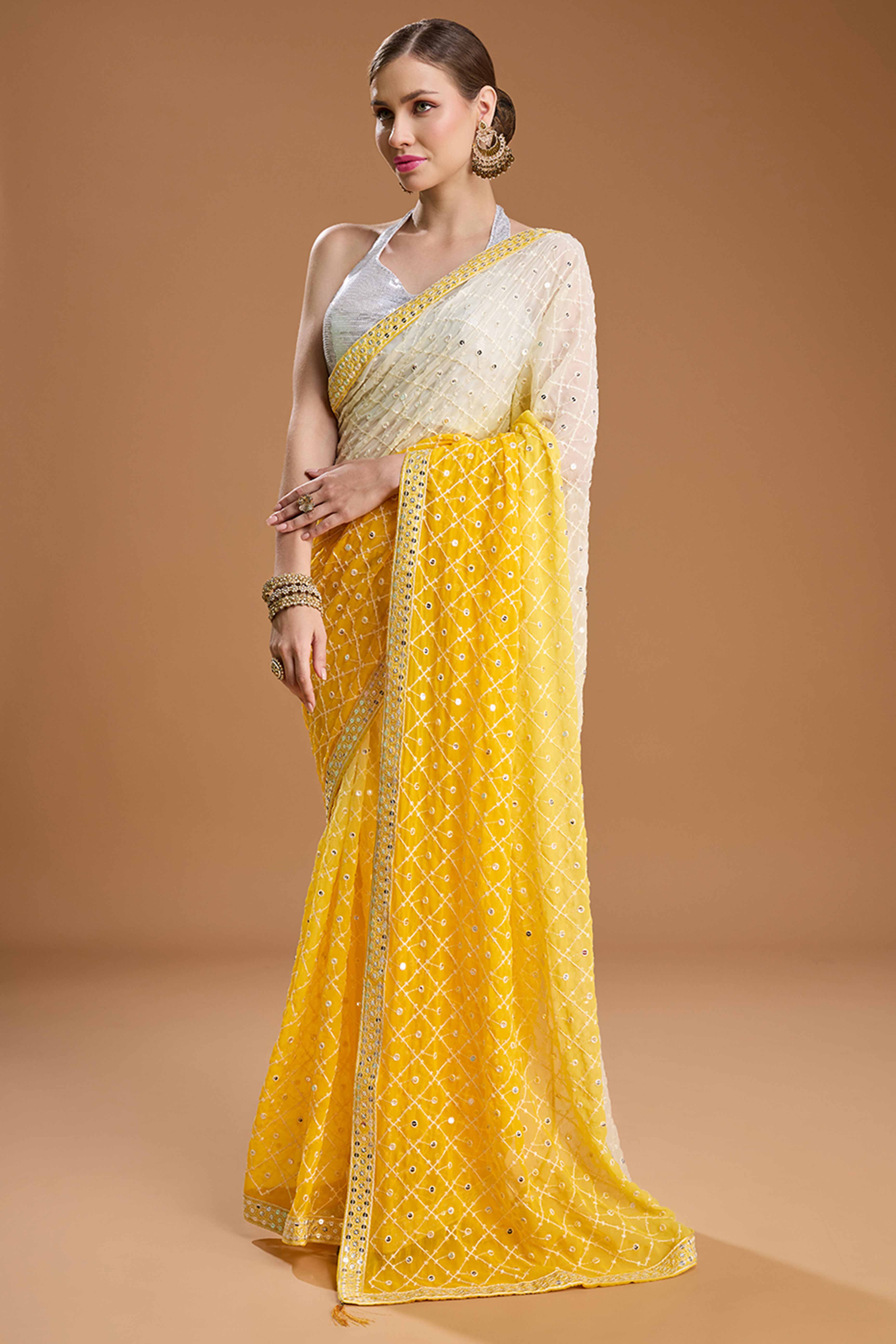 Yellow Georgette Saree Enhanced with Elegant Sequins Embellishments