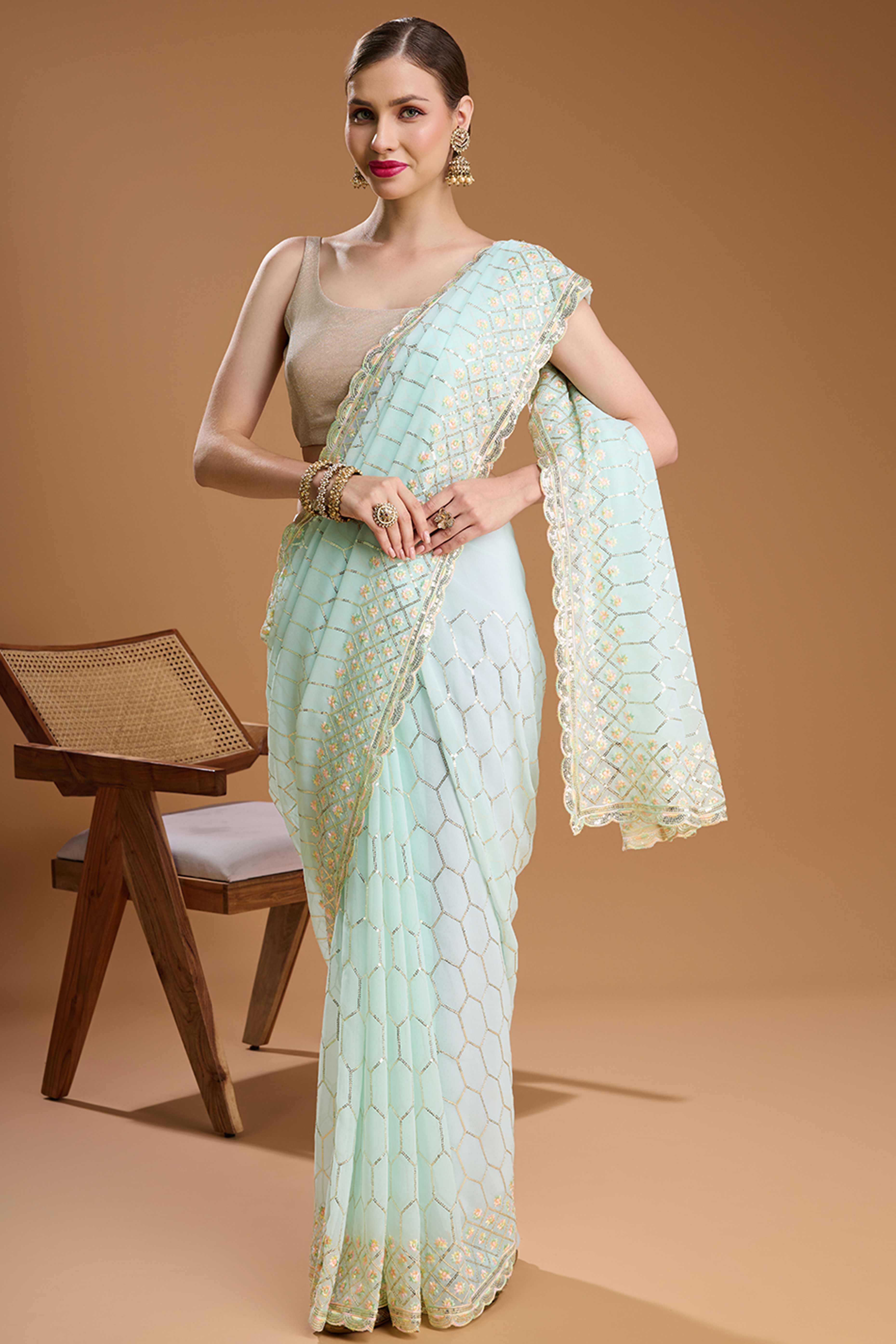 Mint Green Georgette Saree Enhanced with Elegant Sequins Embellishments